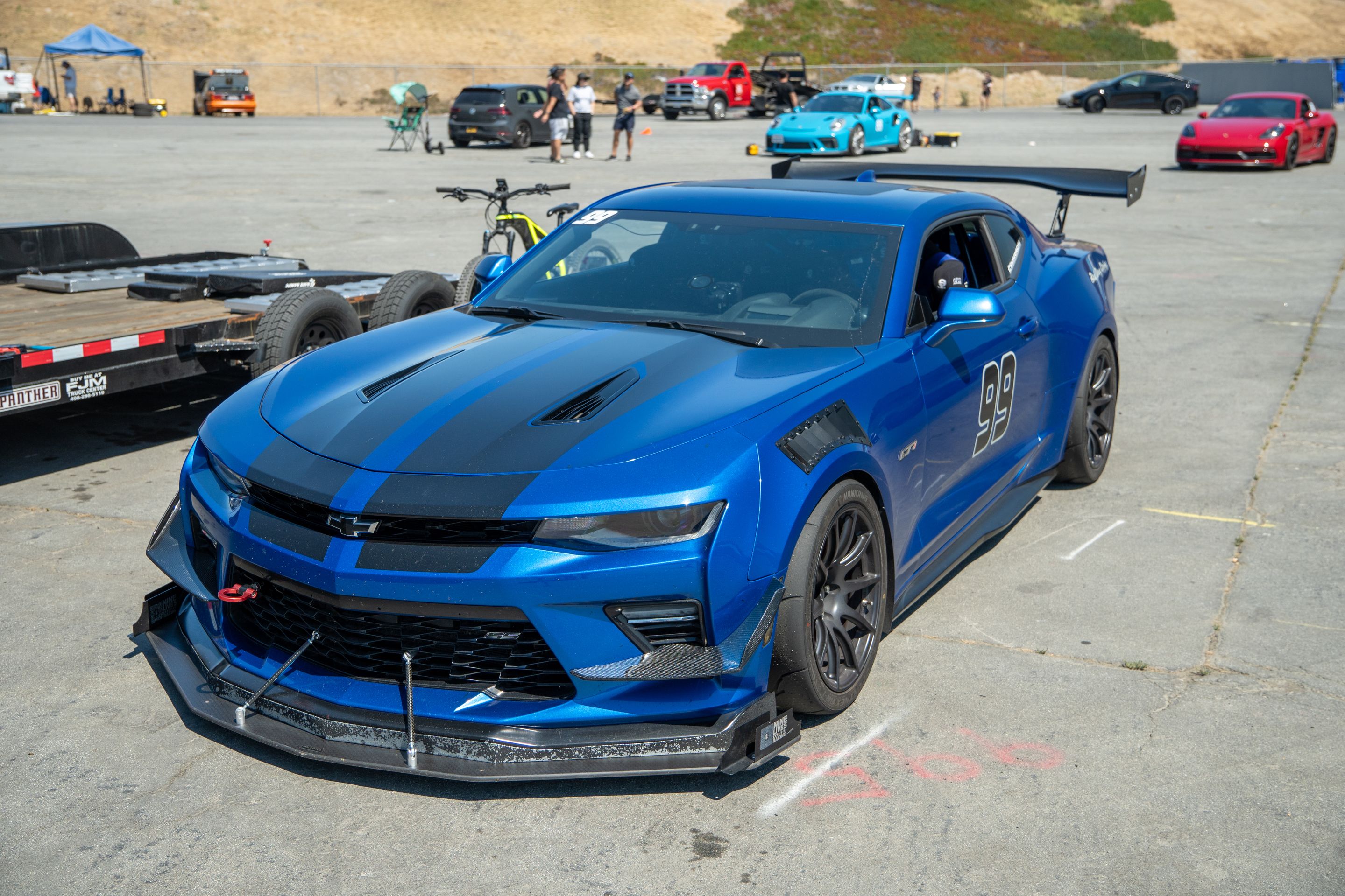 Blue Chevrolet 6th Gen Camaro SS with 18" SM-10 Apex wheels in Satin Black