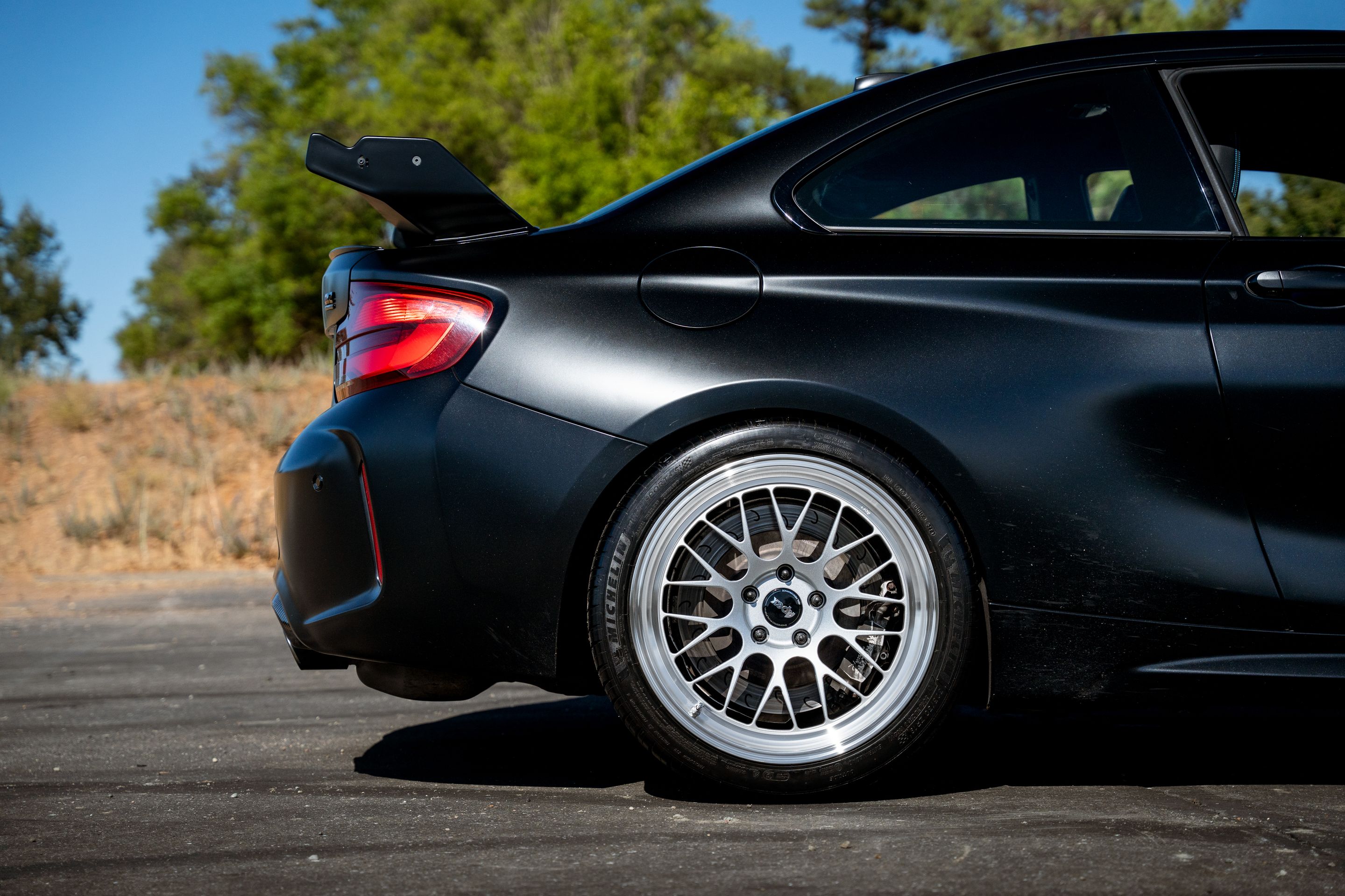 Black BMW F87 M2 with 19" ML-10RT Apex wheels in Machined Lip Race Silver