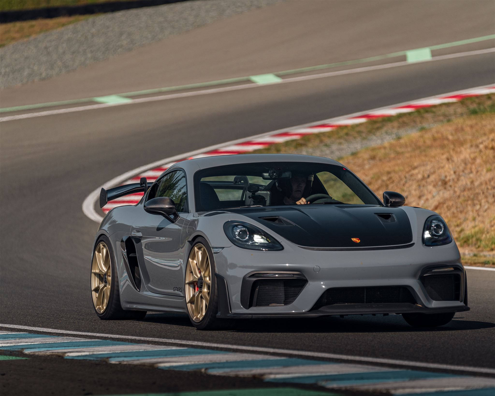 Grey Porsche 718 Cayman GT4 RS with 20" VS-5RS Apex wheels in Motorsport Gold