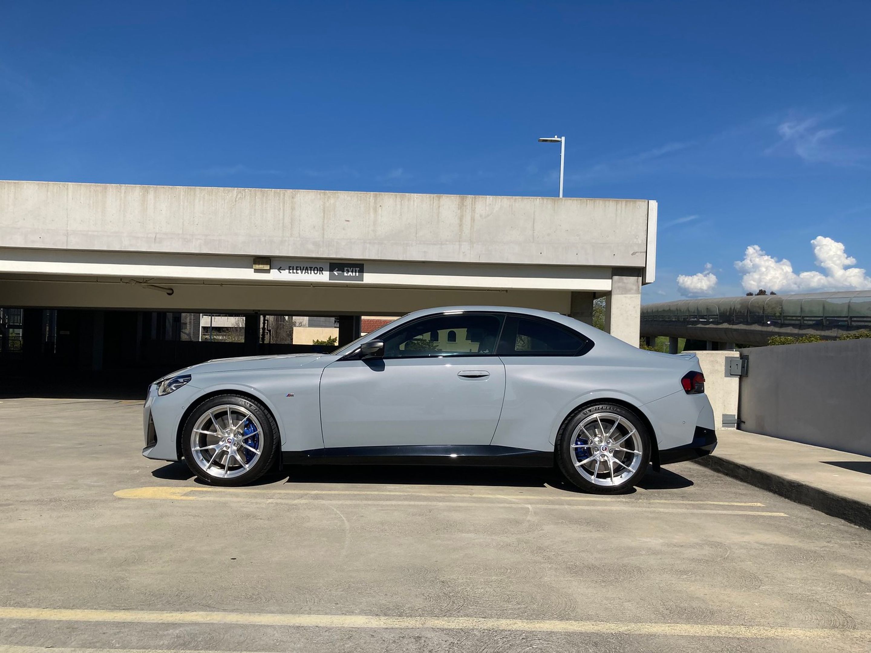 Grey BMW G42 2 Series with 19" VS-5RS Apex wheels in Brushed Clear