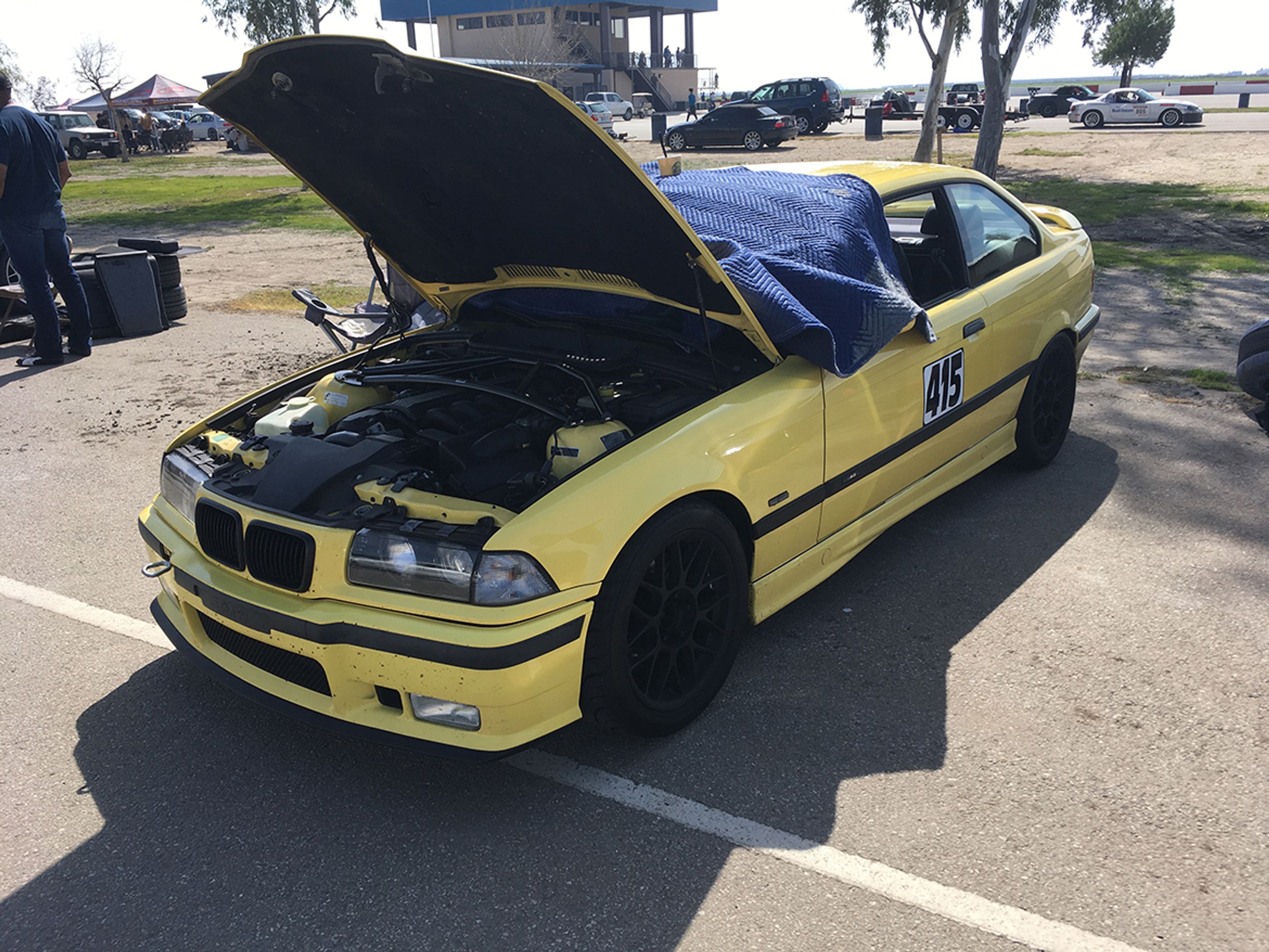 Yellow BMW E36 M3 with 17" ARC-8 Apex wheels in Satin Black