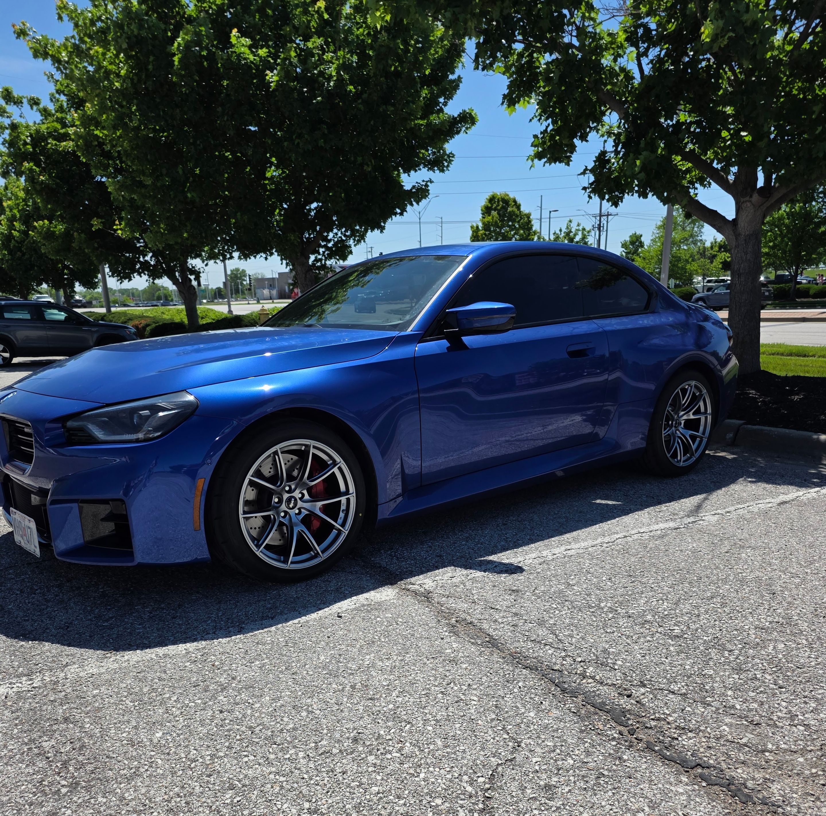 Blue BMW G87 M2 with 19" VS-5 Apex wheels in Hyper Black
