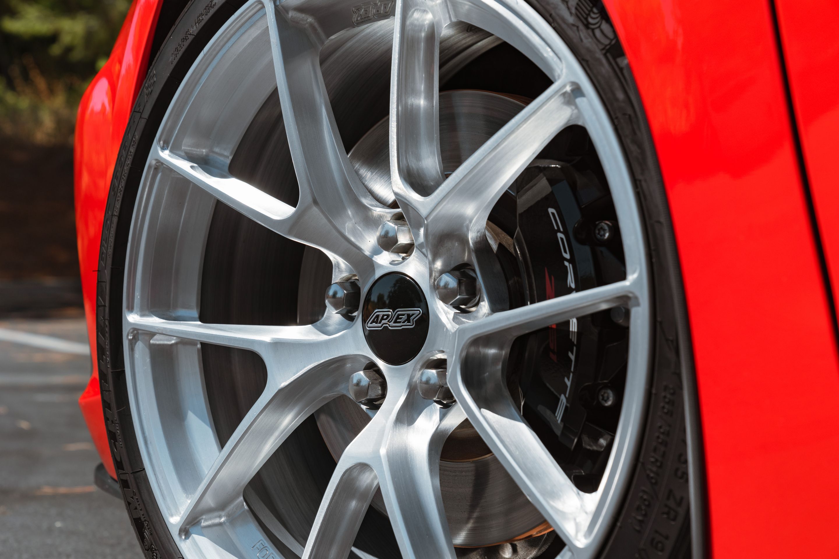 Red Chevrolet C8 Corvette Stingray/Z51 with 19" VS-5RS Apex wheels in Brushed Clear