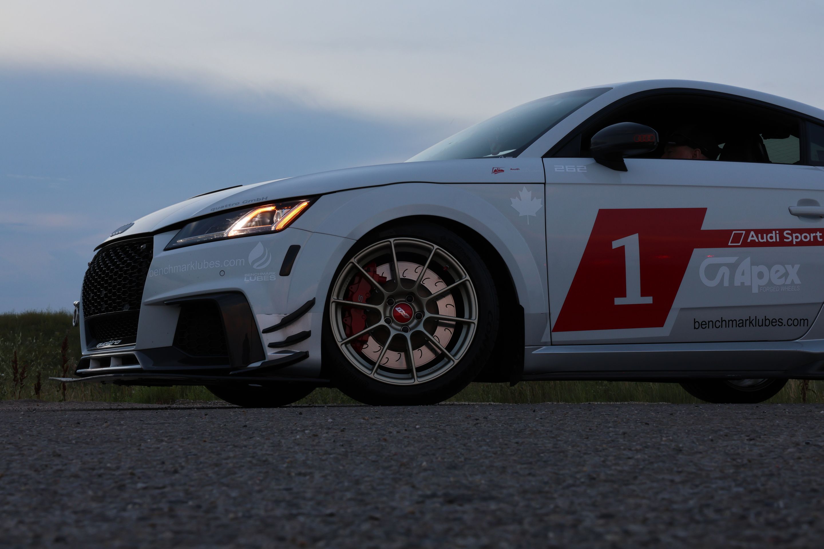 White Audi FV/8S TT RS with 18" SM-10RS Apex wheels in Motorsport Gold