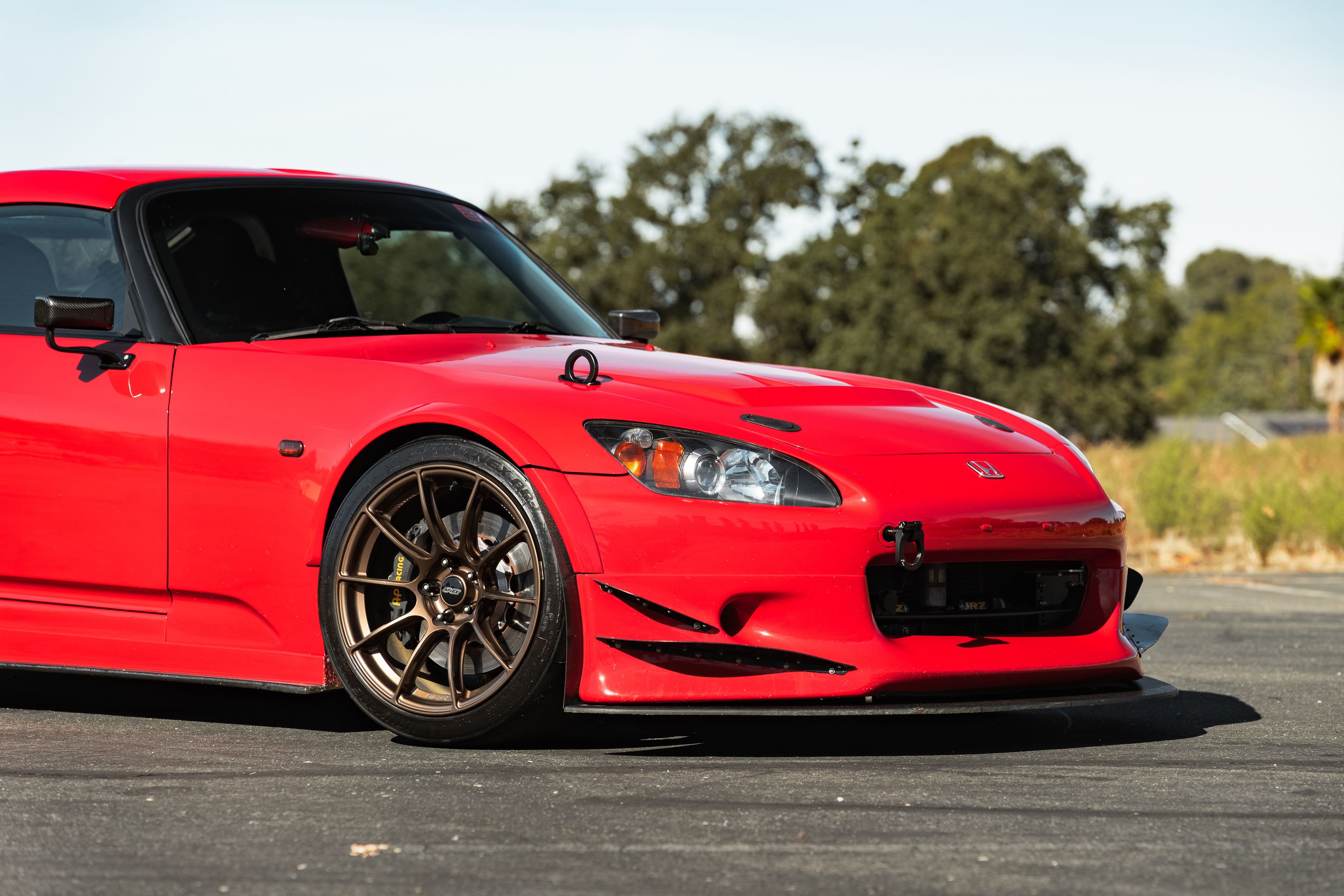 Red Honda S2000 with 18" SM-10RS Apex wheels in Satin Bronze
