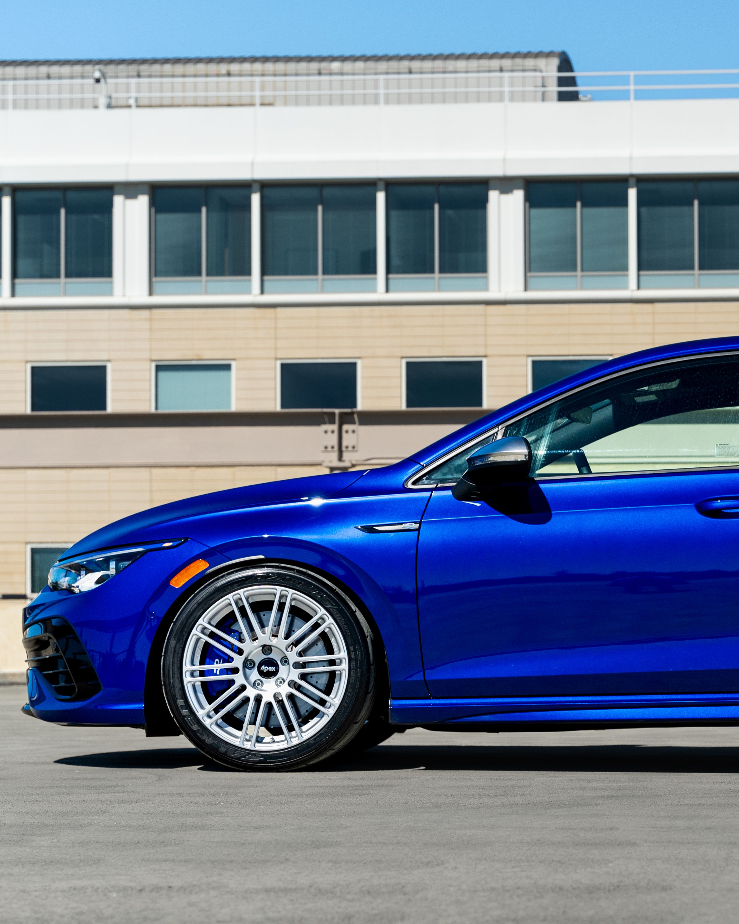 Blue VW MK8 Golf R with 18" TC-10RT Apex wheels in Race Silver