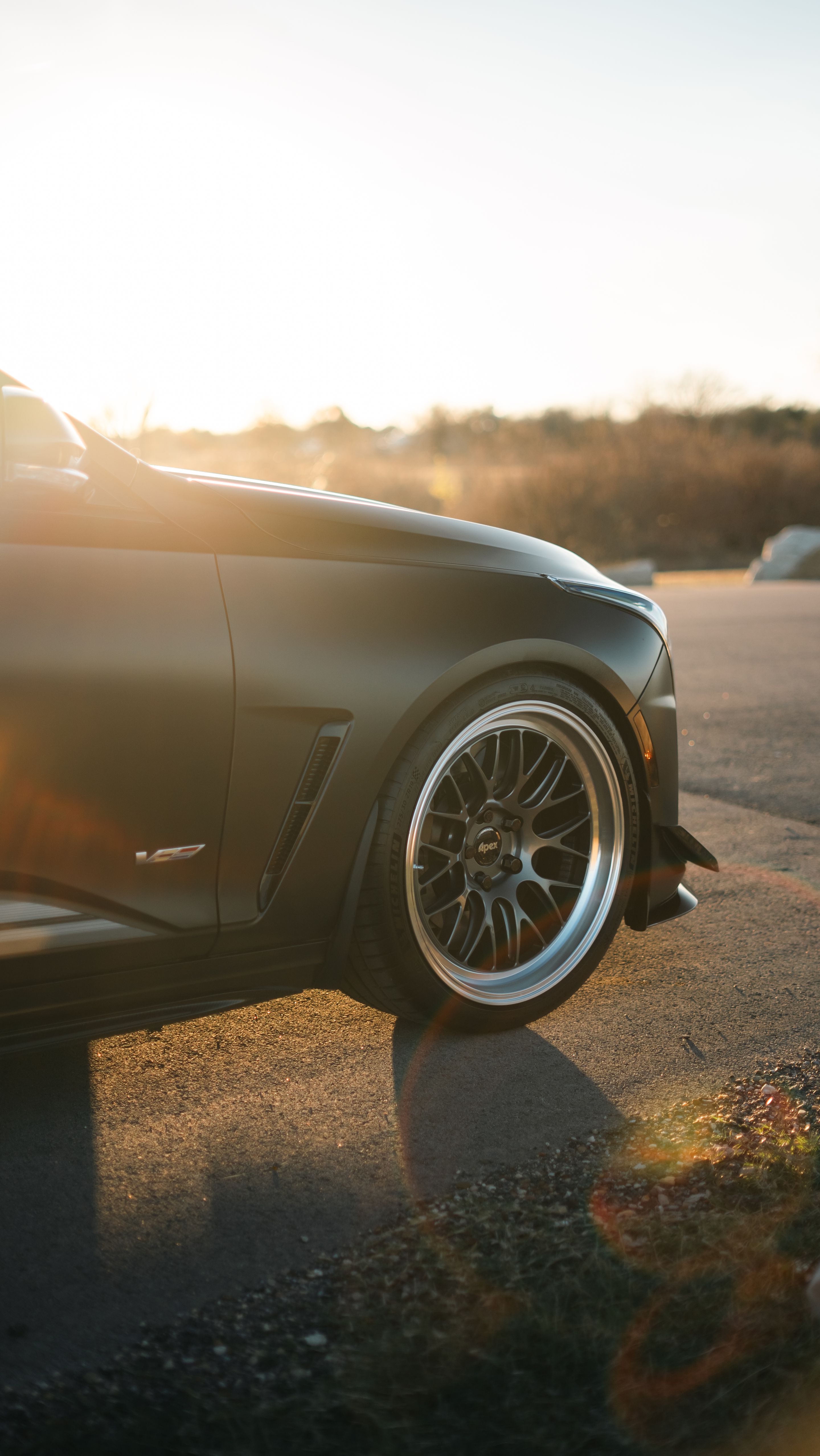 Black Cadillac CT4-V Blackwing with 19" ML-10RT Apex wheels in Machined Lip Anthracite