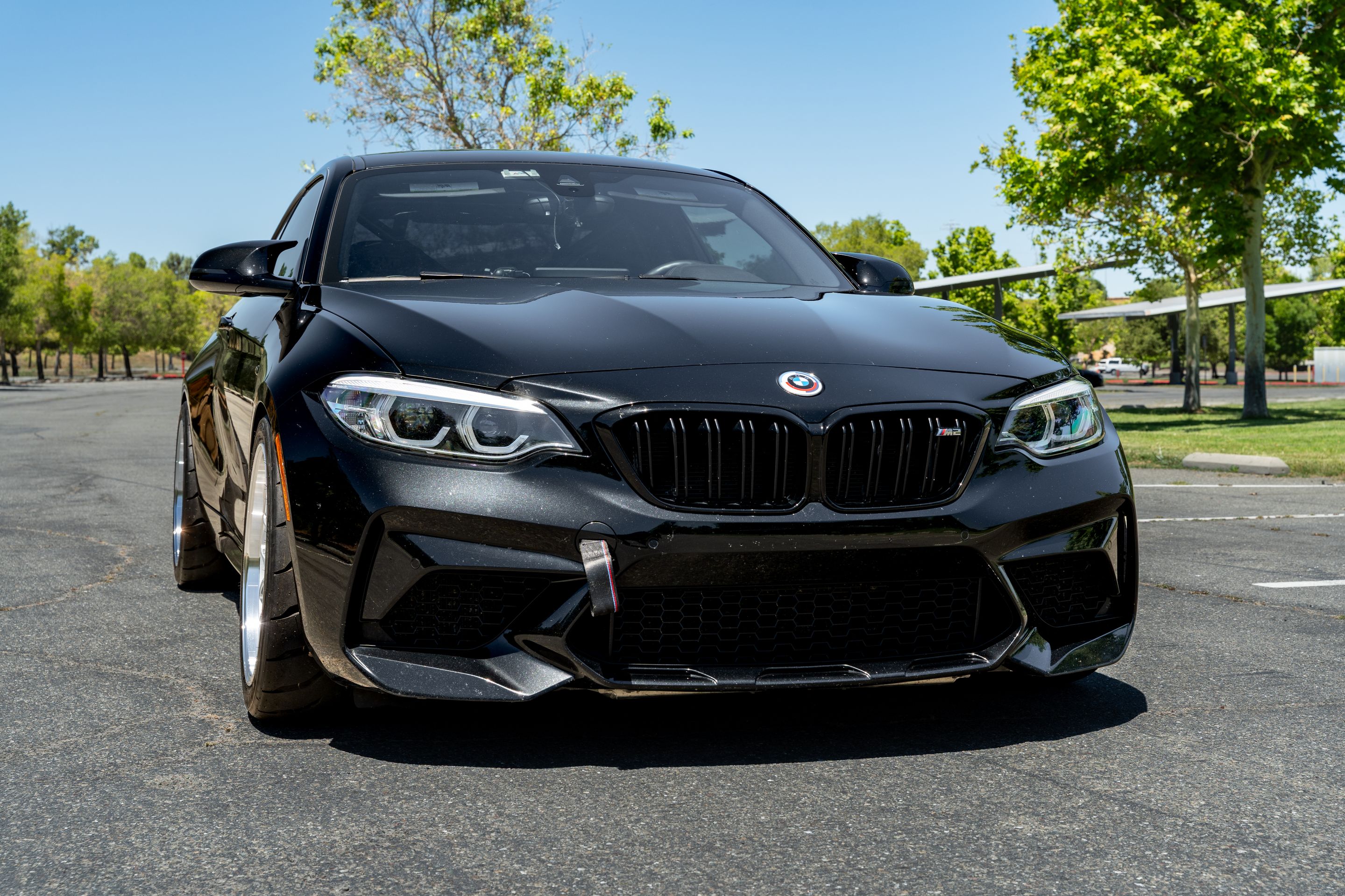 Black BMW F87 M2 with 18" ML-7RT Apex wheels in Machined Lip Race Silver