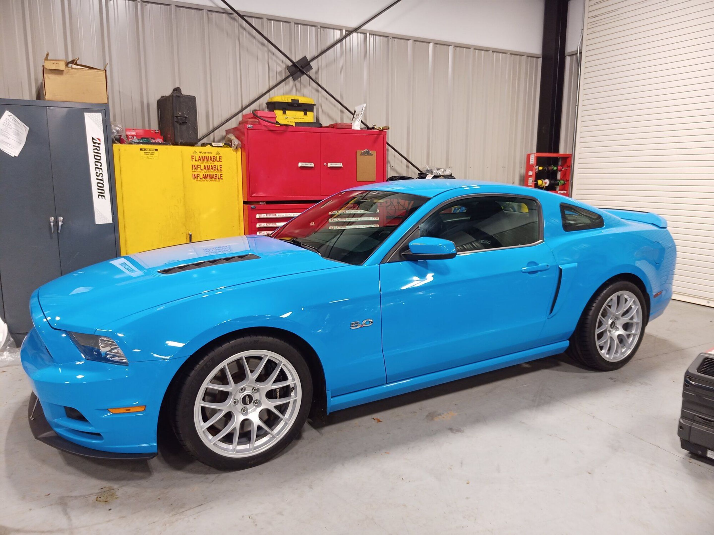 Blue Ford S197 Mustang GT with 19" EC-7 Apex wheels in Race Silver