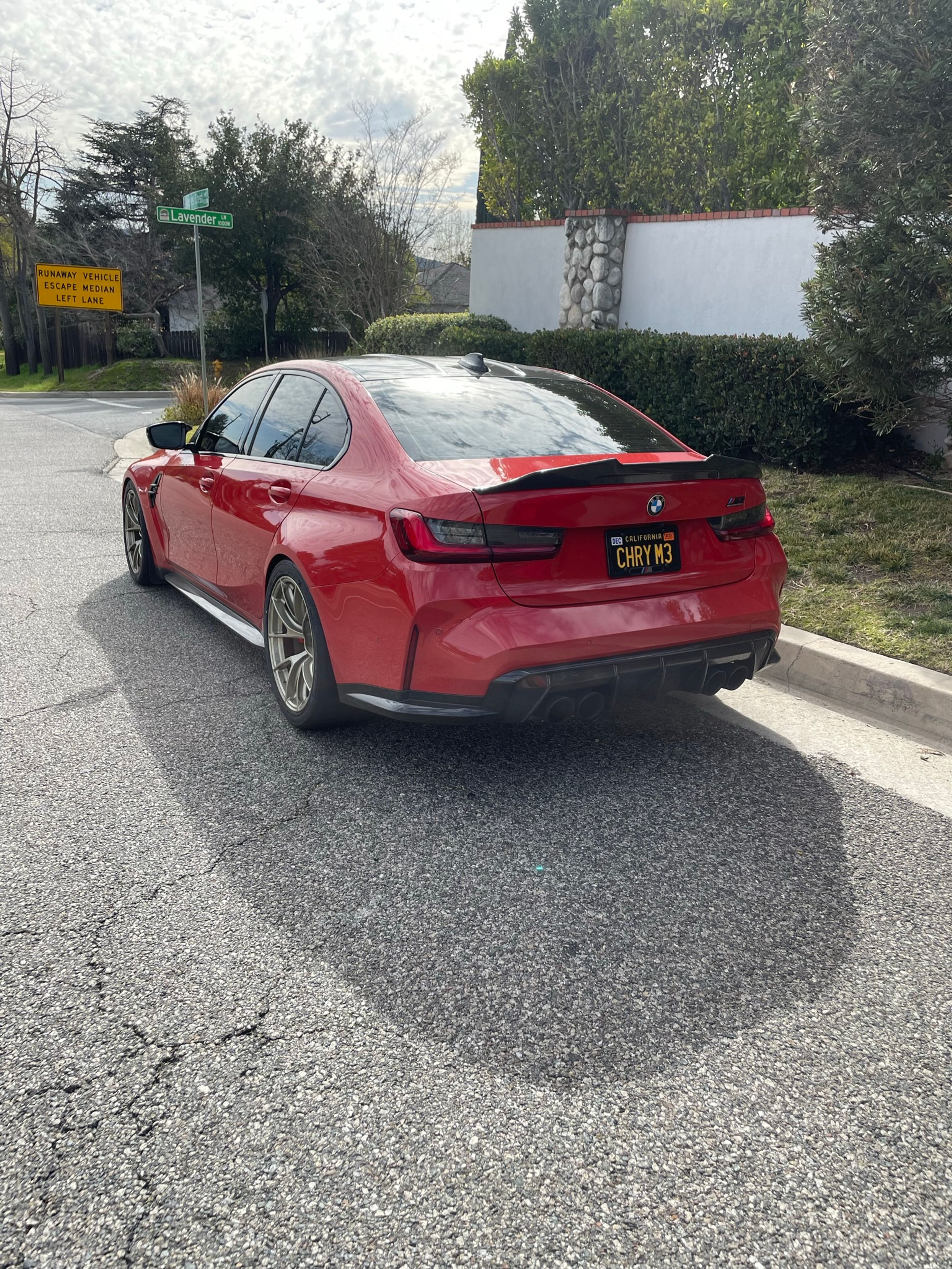 Red BMW G80 M3 with 19" VS-5RS Apex wheels in Motorsport Gold