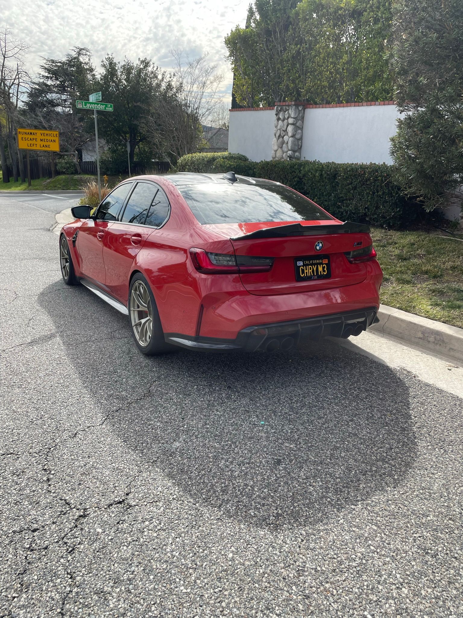 Red BMW G80 M3 with 19" VS-5RS Apex wheels in Motorsport Gold