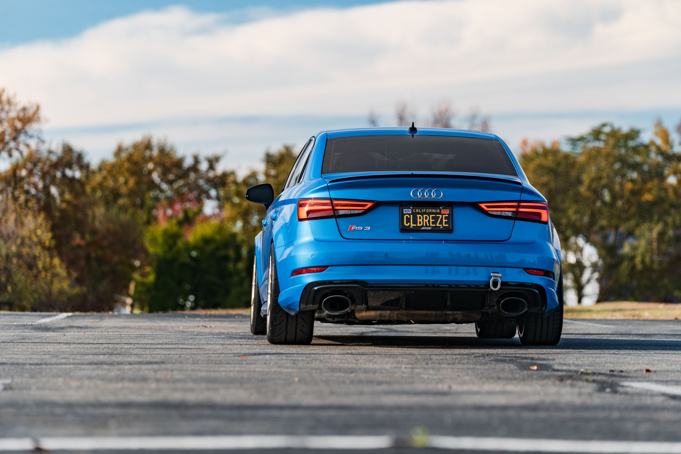 Blue Audi 8V RS 3 with 18" SM-10RS Apex wheels in Motorsport Gold