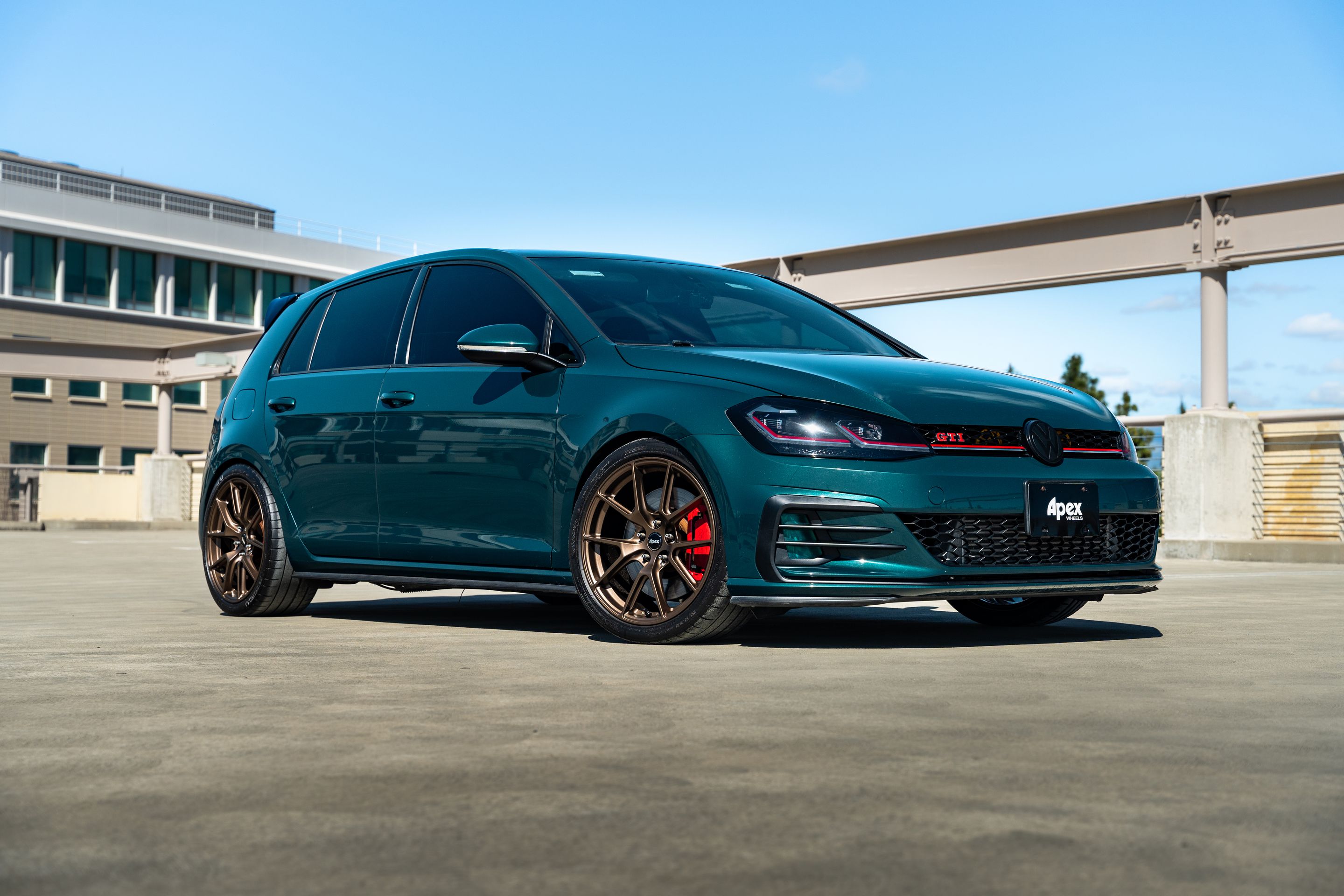 Green VW MK7 GTI with 18" VS-5 Apex wheels in Satin Bronze