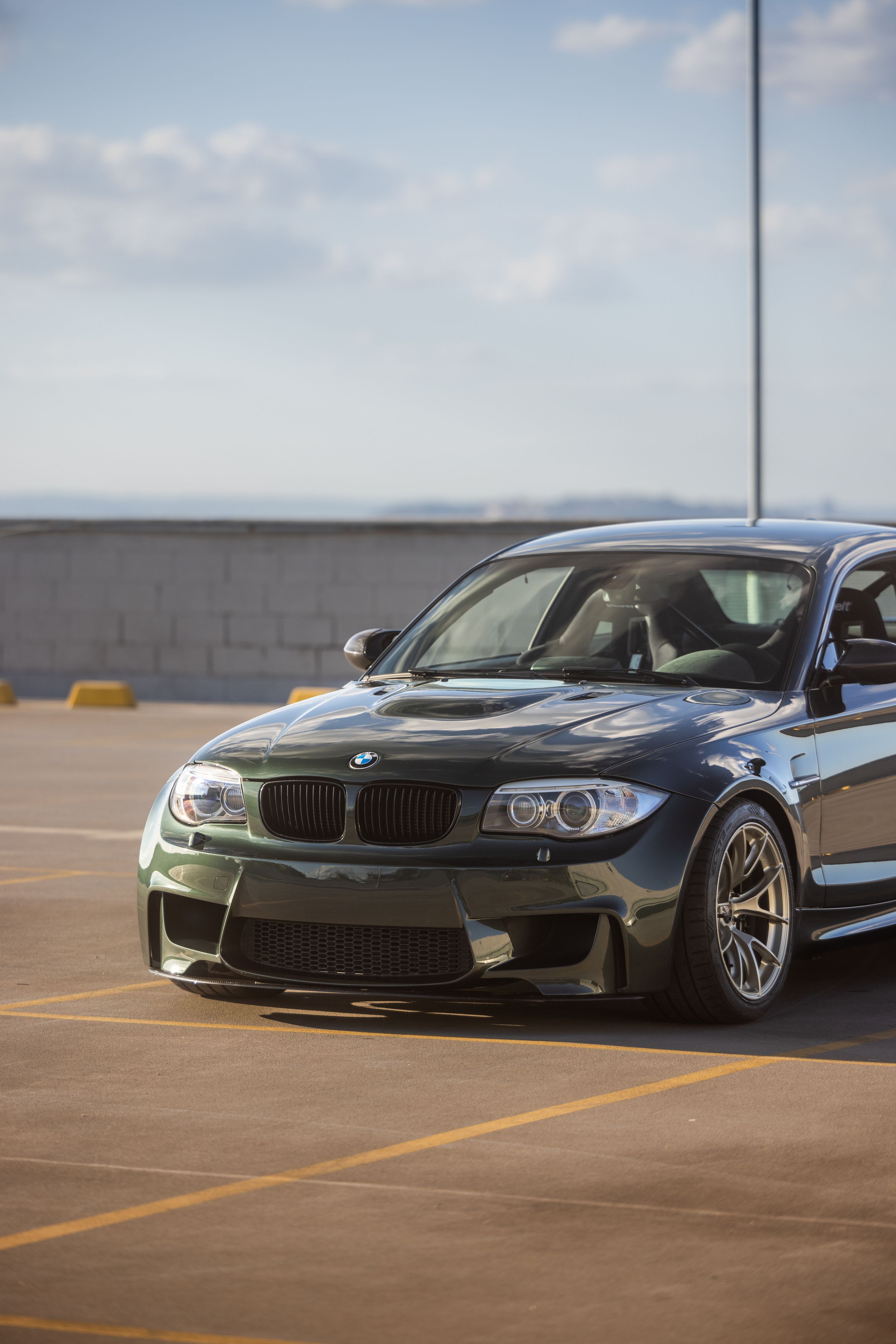 Green BMW E82 1M with 18" VS-5RS Apex wheels in Motorsport Gold