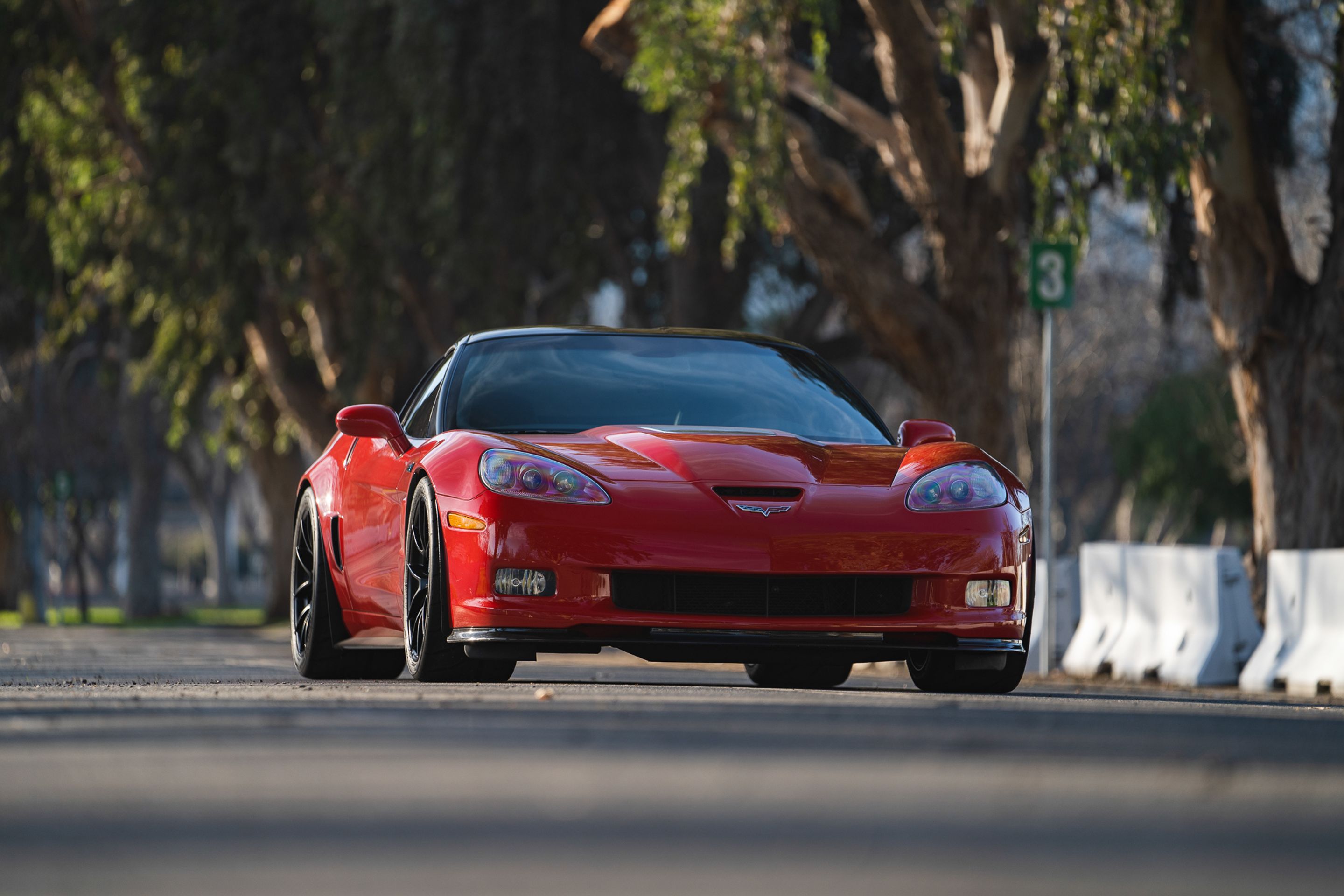 Red Chevrolet C6 Corvette ZR-1 with 19" VS-5RS Apex wheels in Satin Black