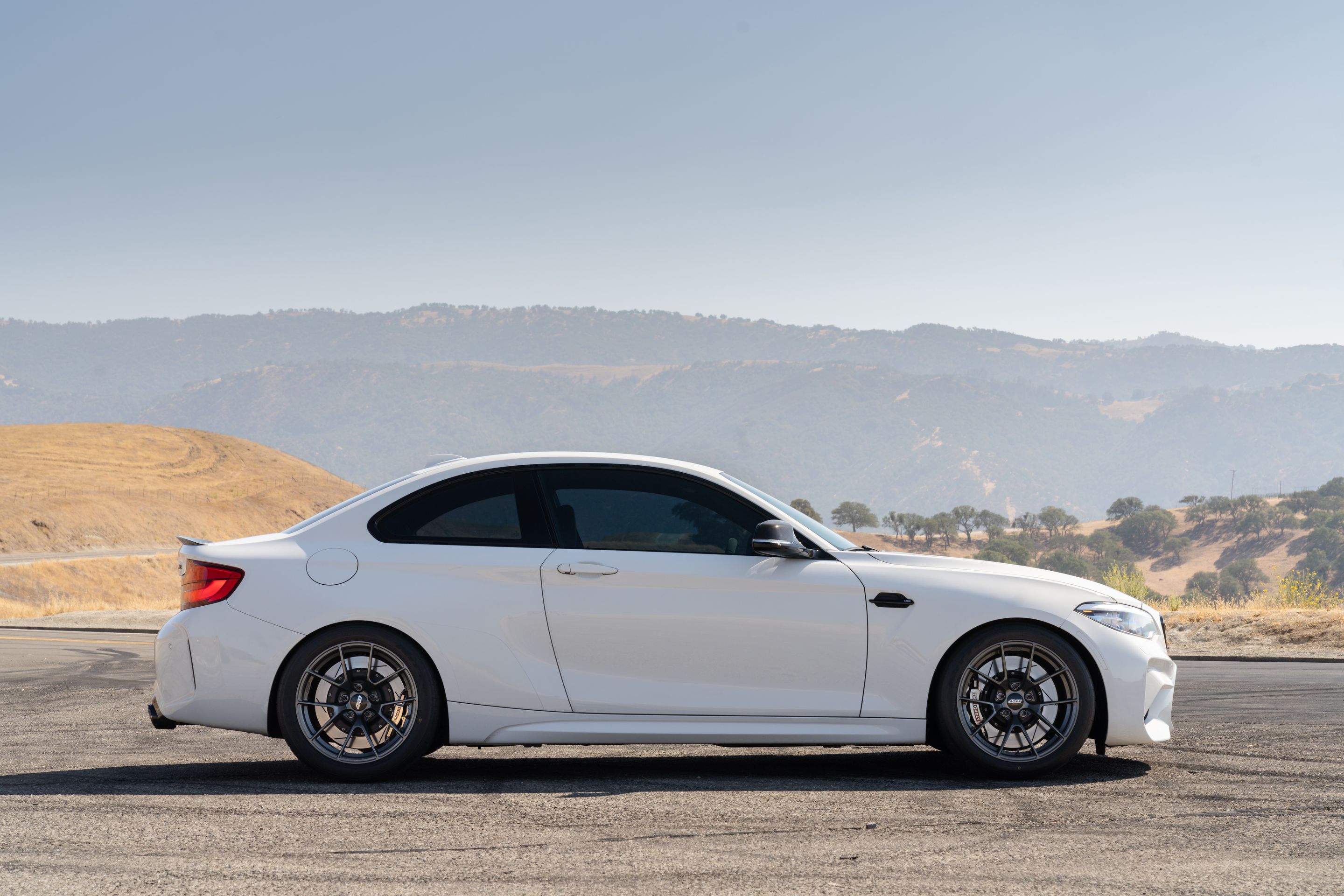 White BMW F87 M2 with 18" VS-5RS Apex wheels in Anthracite