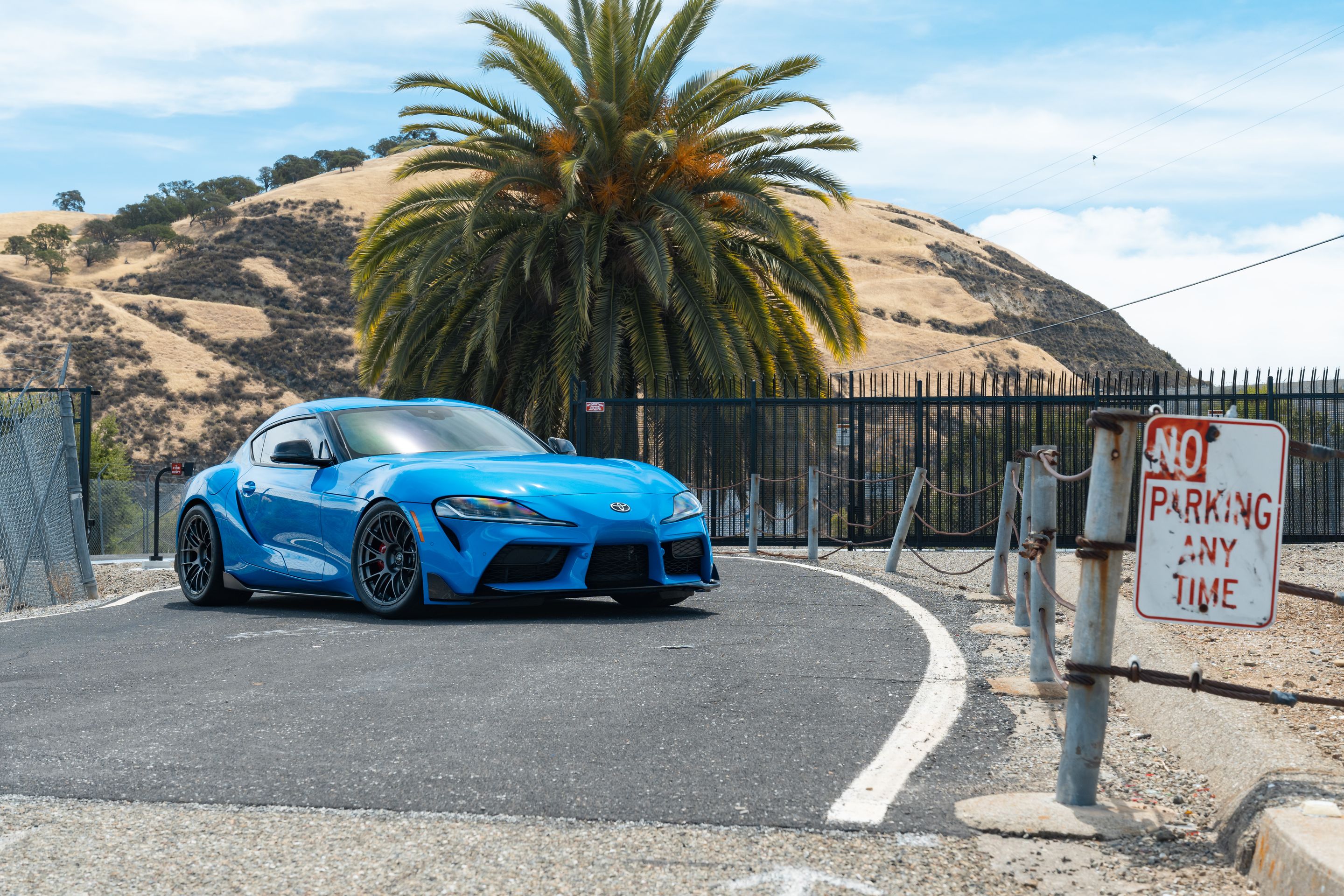 Blue Toyota GR Supra with 18" EC-7RS Apex wheels in Anthracite