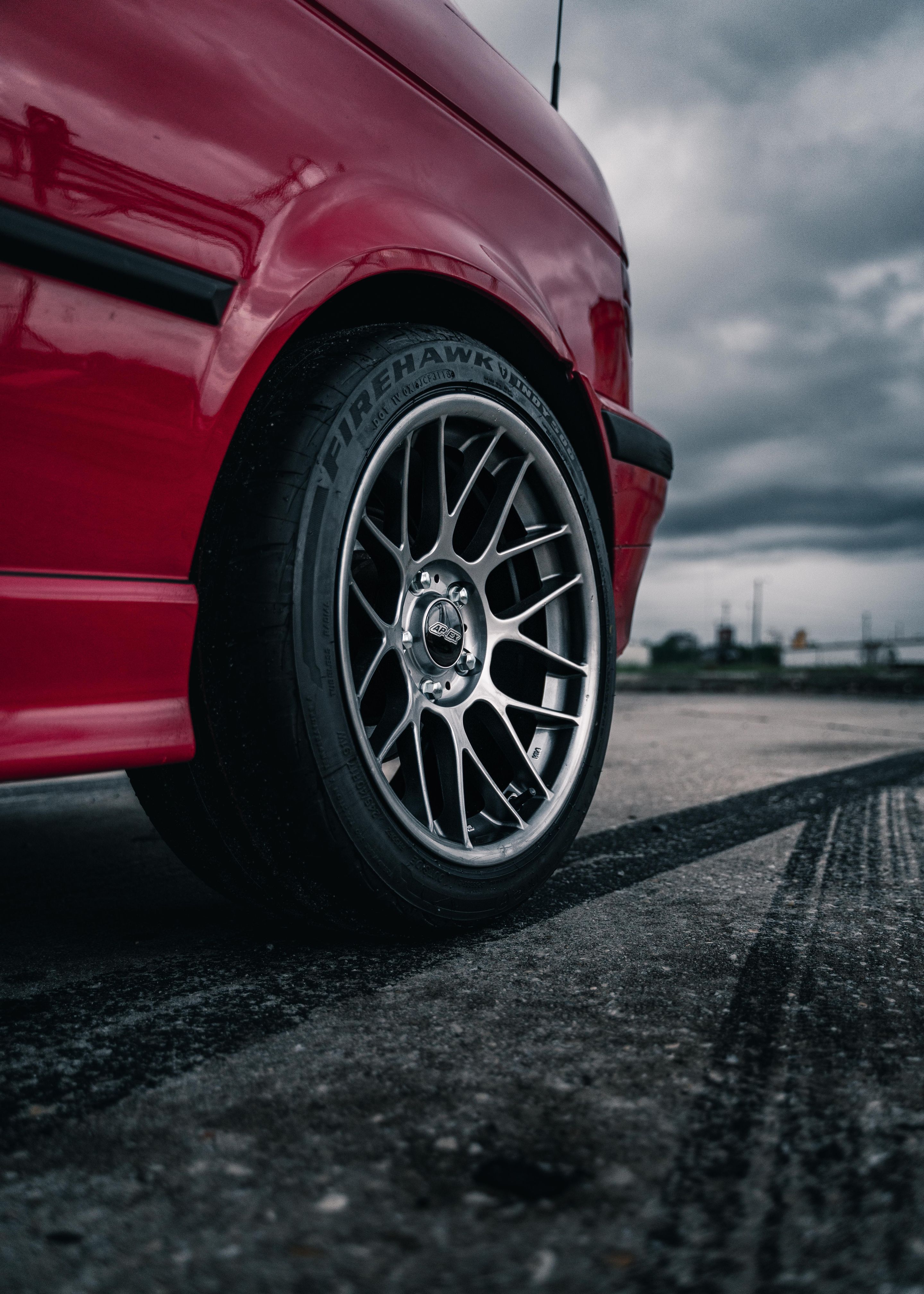 Red BMW E36 3 Series with 17" ARC-8 Apex wheels in Hyper Black