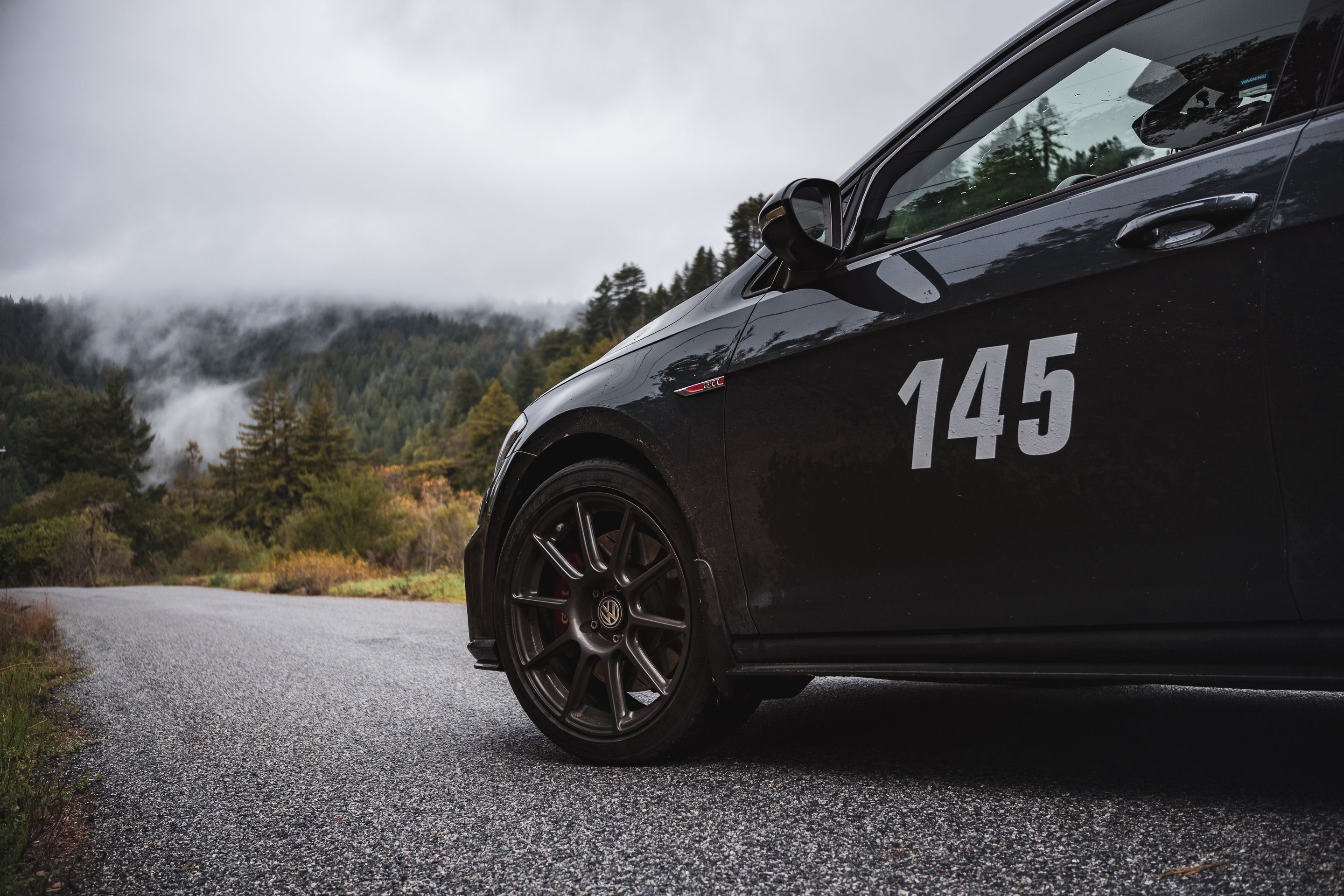 Black VW MK7 GTI with 17" SM-10 Apex wheels in Anthracite