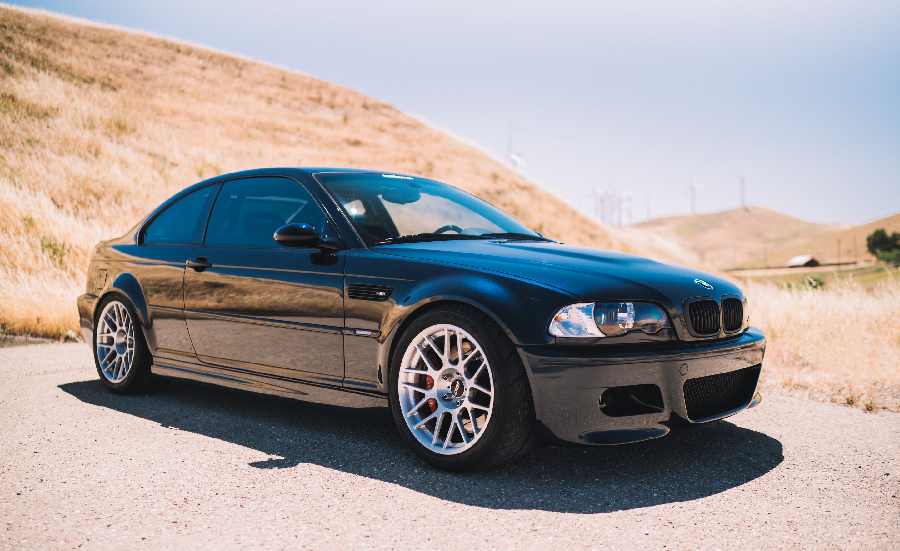 Black BMW E46 M3 with 18" ARC-8R Apex wheels in Brushed Clear