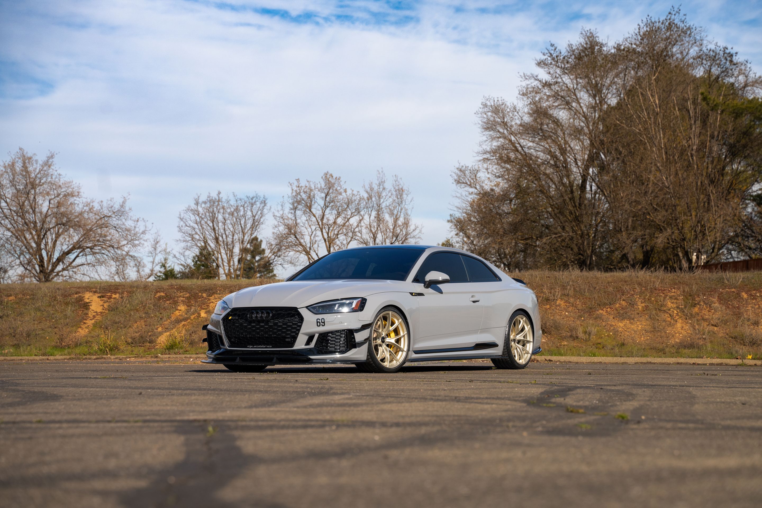 Grey Audi B9 RS 5 Coupe with 20" VS-5RS Apex wheels in Motorsport Gold