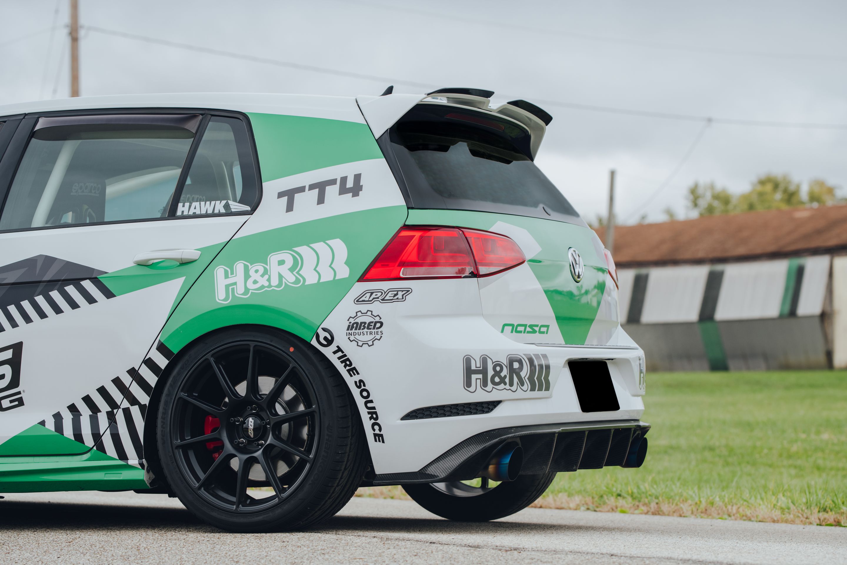 Race Livery VW MK7 GTI with 18" SM-10 Apex wheels in Satin Black