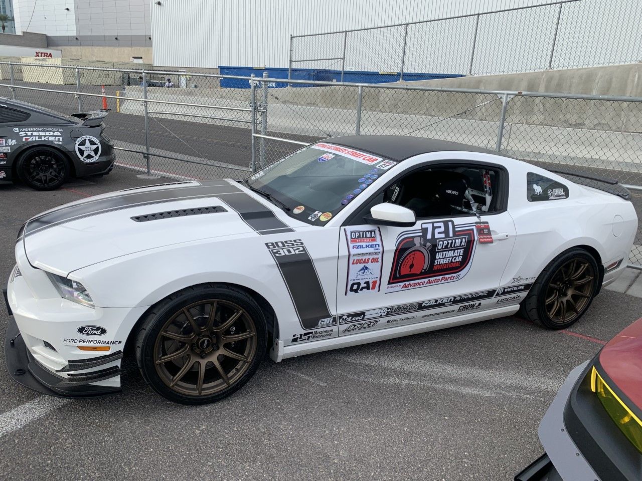 White Ford S197 Mustang Boss 302 with 19" SM-10 Apex wheels in Satin Bronze