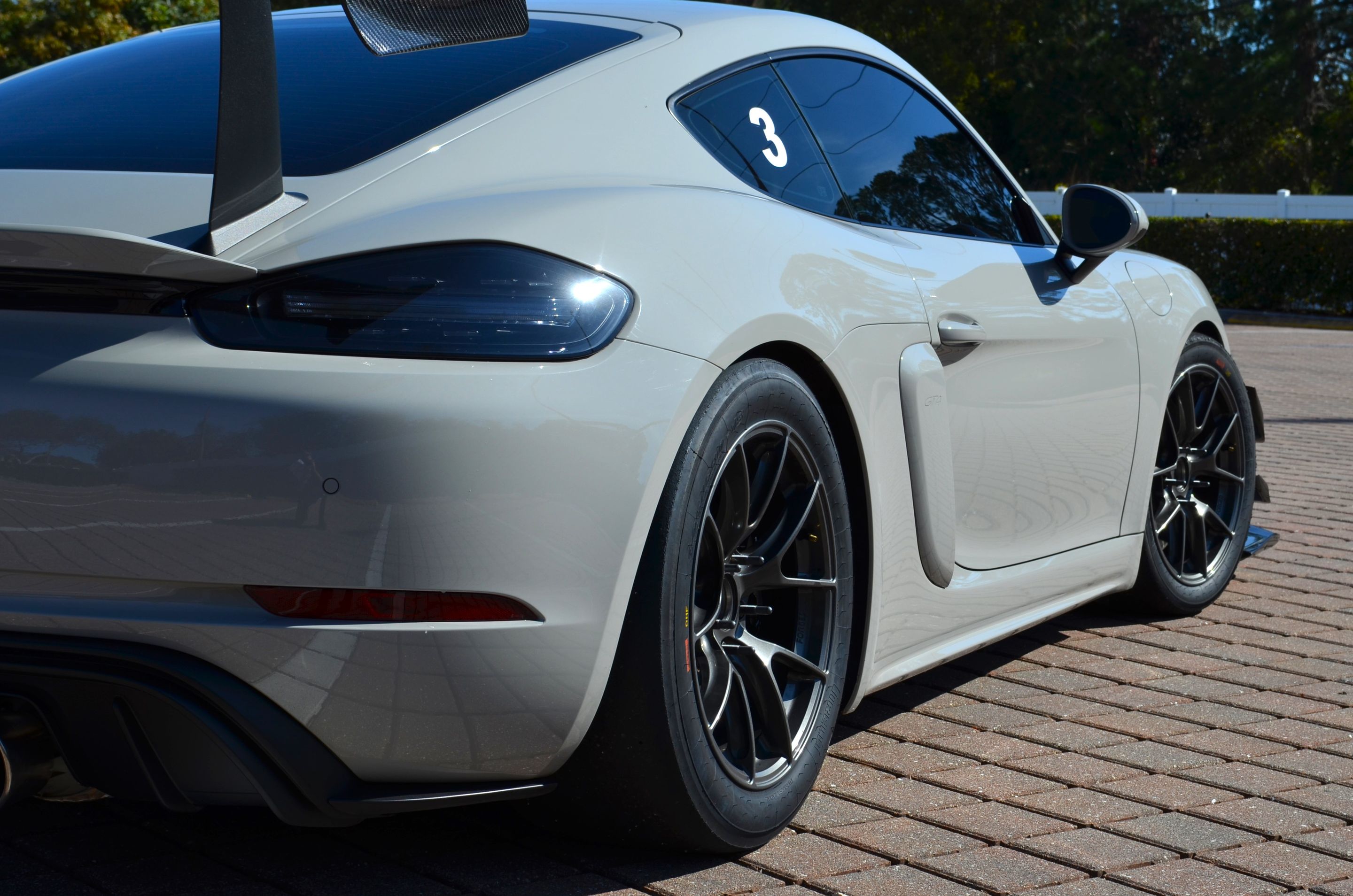 Grey Porsche 718 Cayman GT4 with 18" VS-5RS Apex wheels in Anthracite