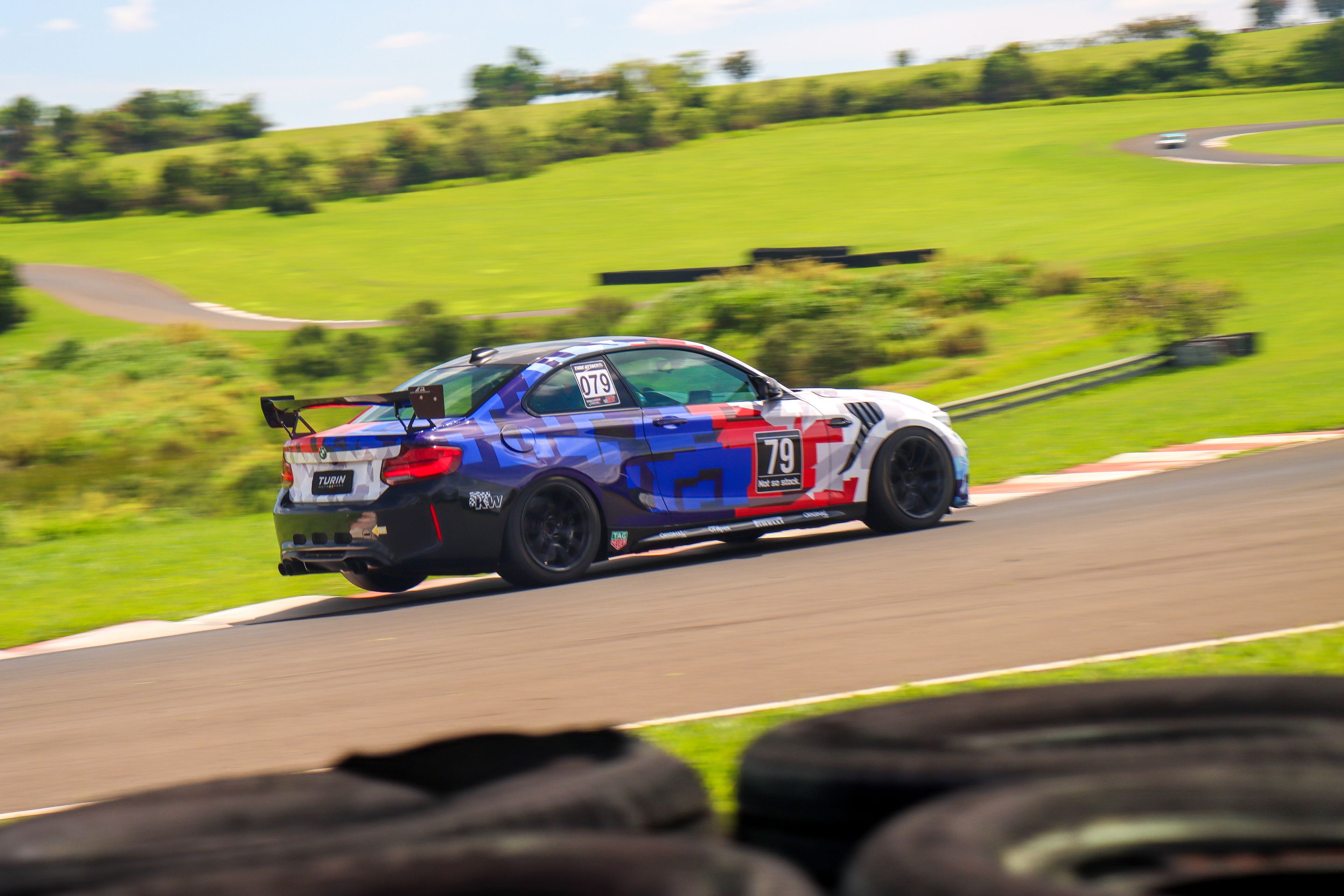 Multicolor BMW F87 M2 with 18" EC-7 Apex wheels in Satin Black