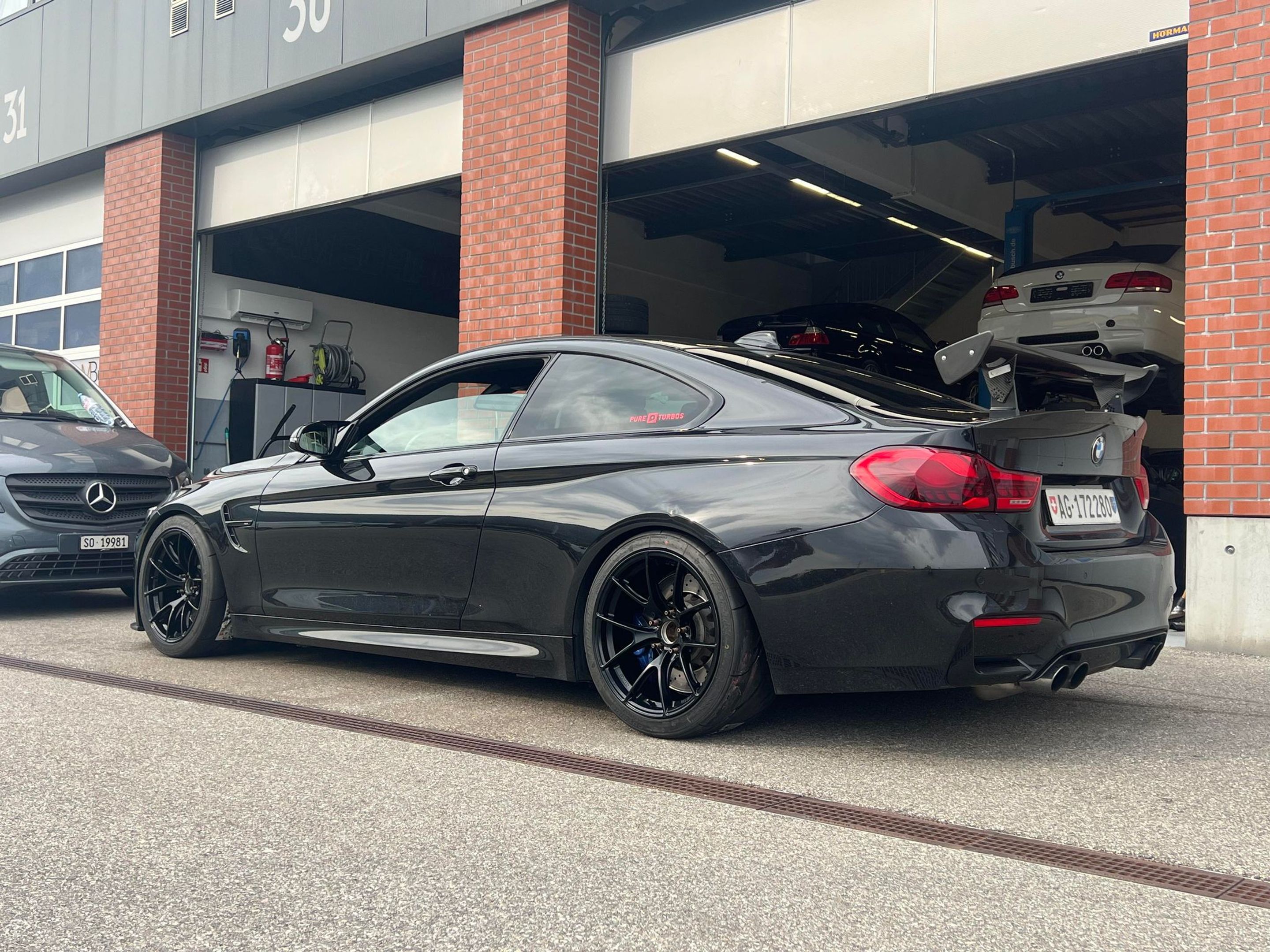 Black BMW F82 Coupe M4 with 18" VS-5RS Apex wheels in Satin Black