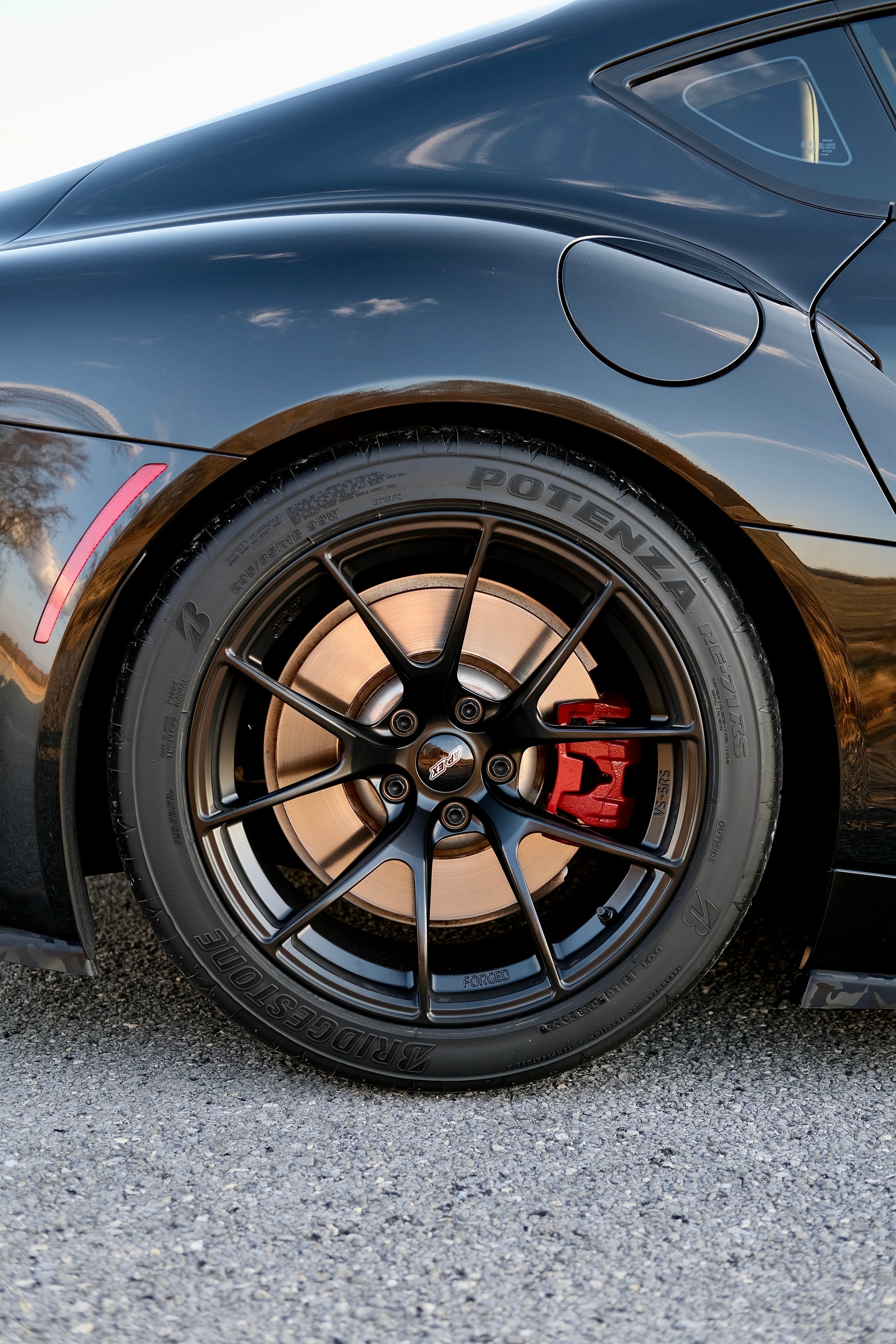 Black Toyota GR Supra with 18" VS-5RS Apex wheels in Satin Black