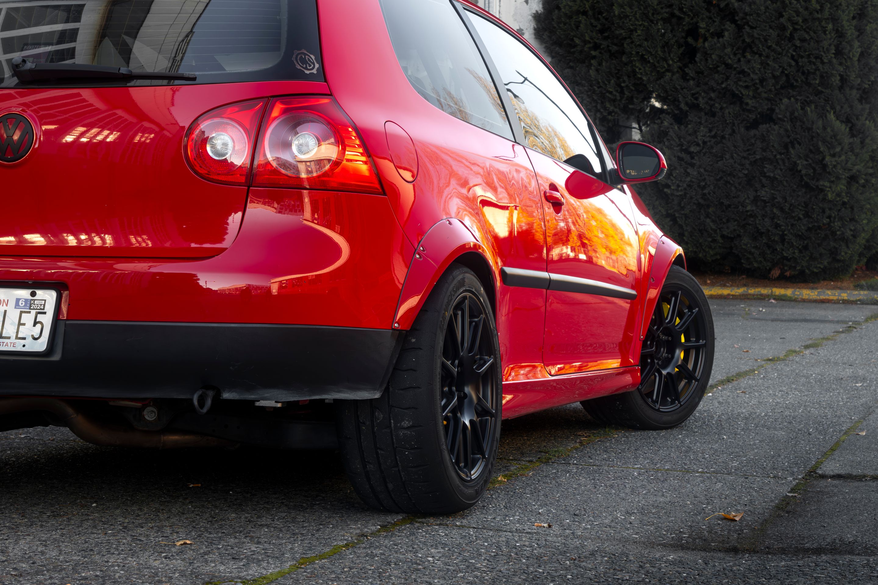 Red VW MK5 Golf with 17" SM-10 Apex wheels in Satin Black