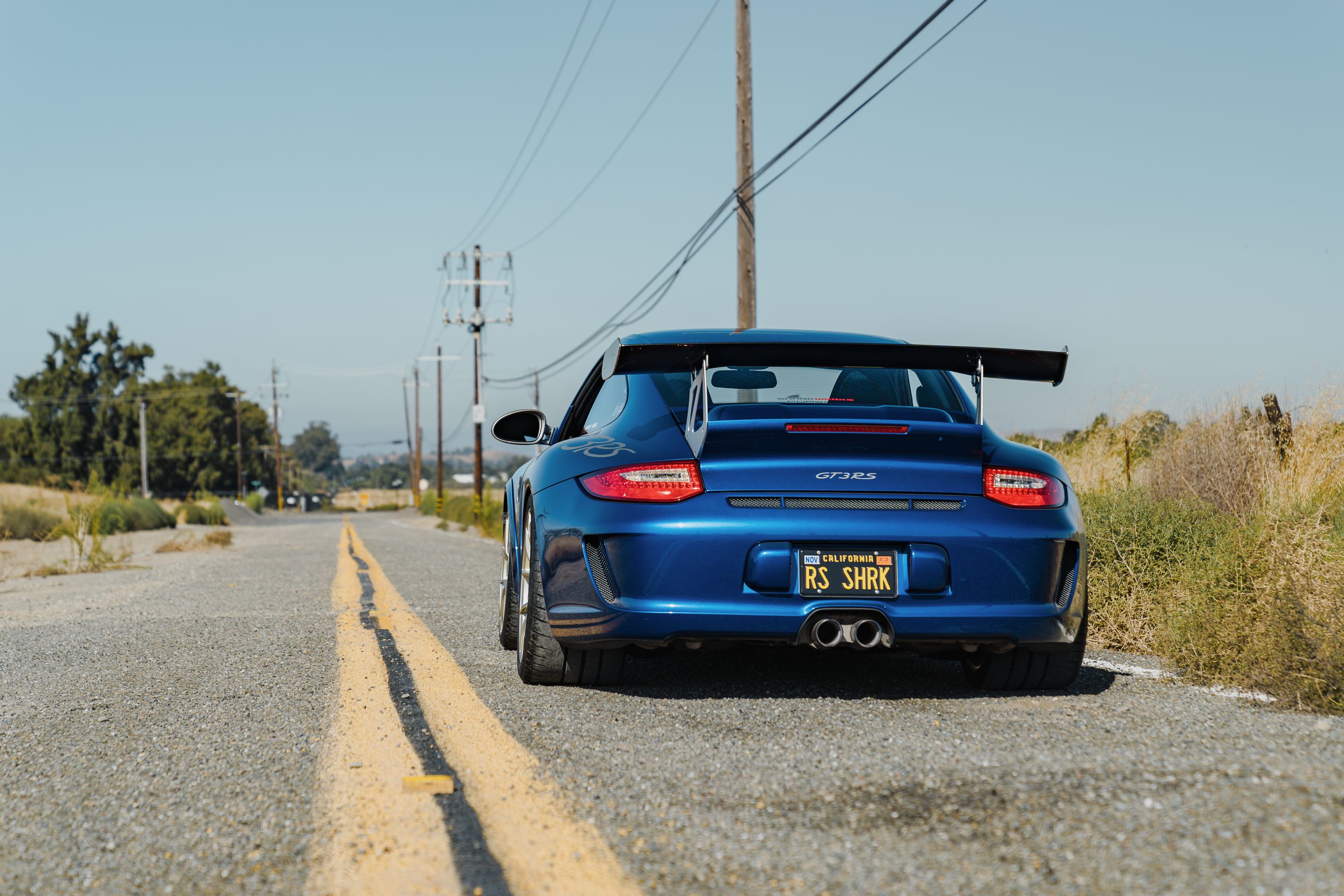 Blue Porsche 911 997 GT3 RS with 19" VS-5RS Apex wheels in Motorsport Gold