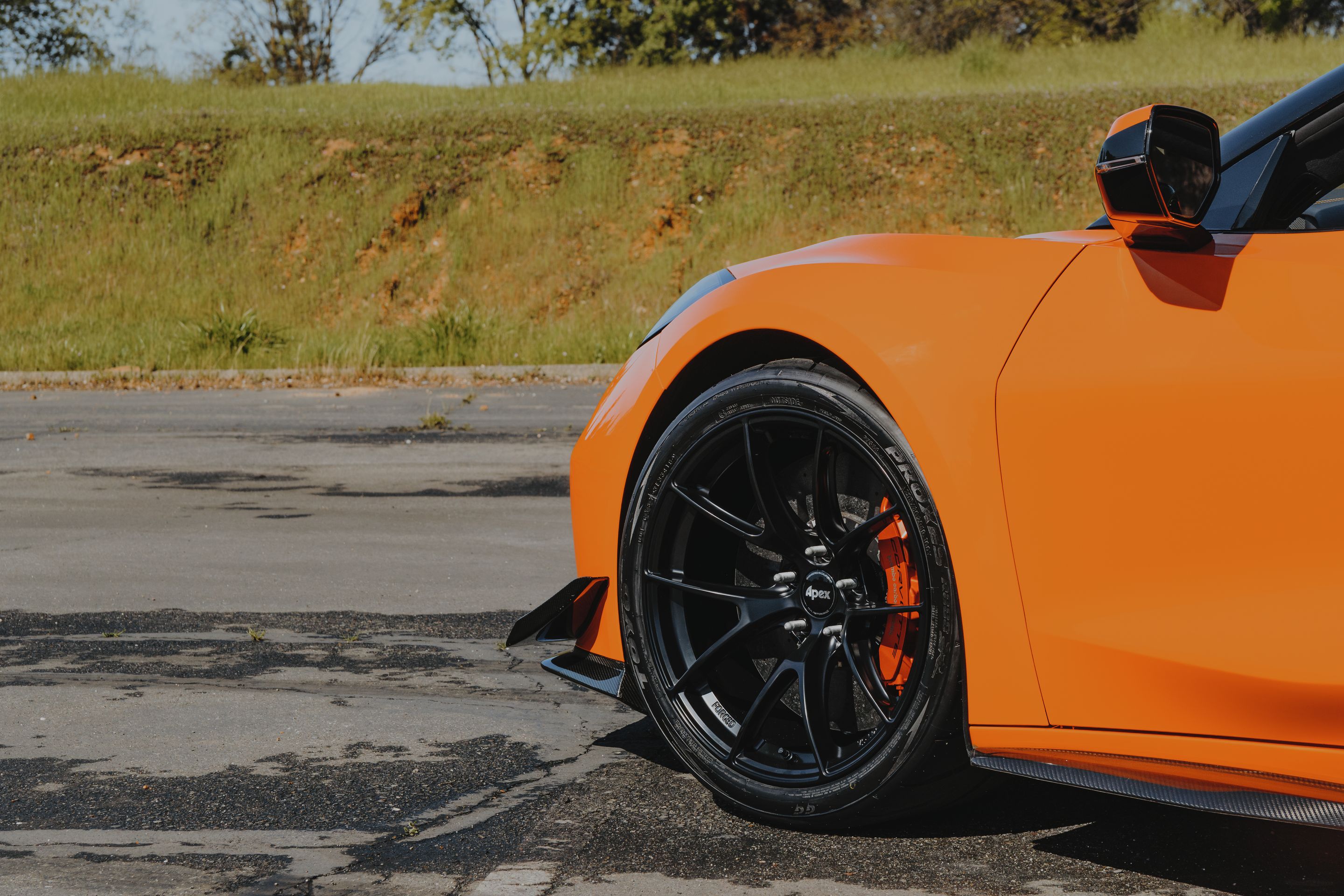 Orange Chevrolet C8 Corvette Z06 with 19" VS-5RS Apex wheels in Satin Black