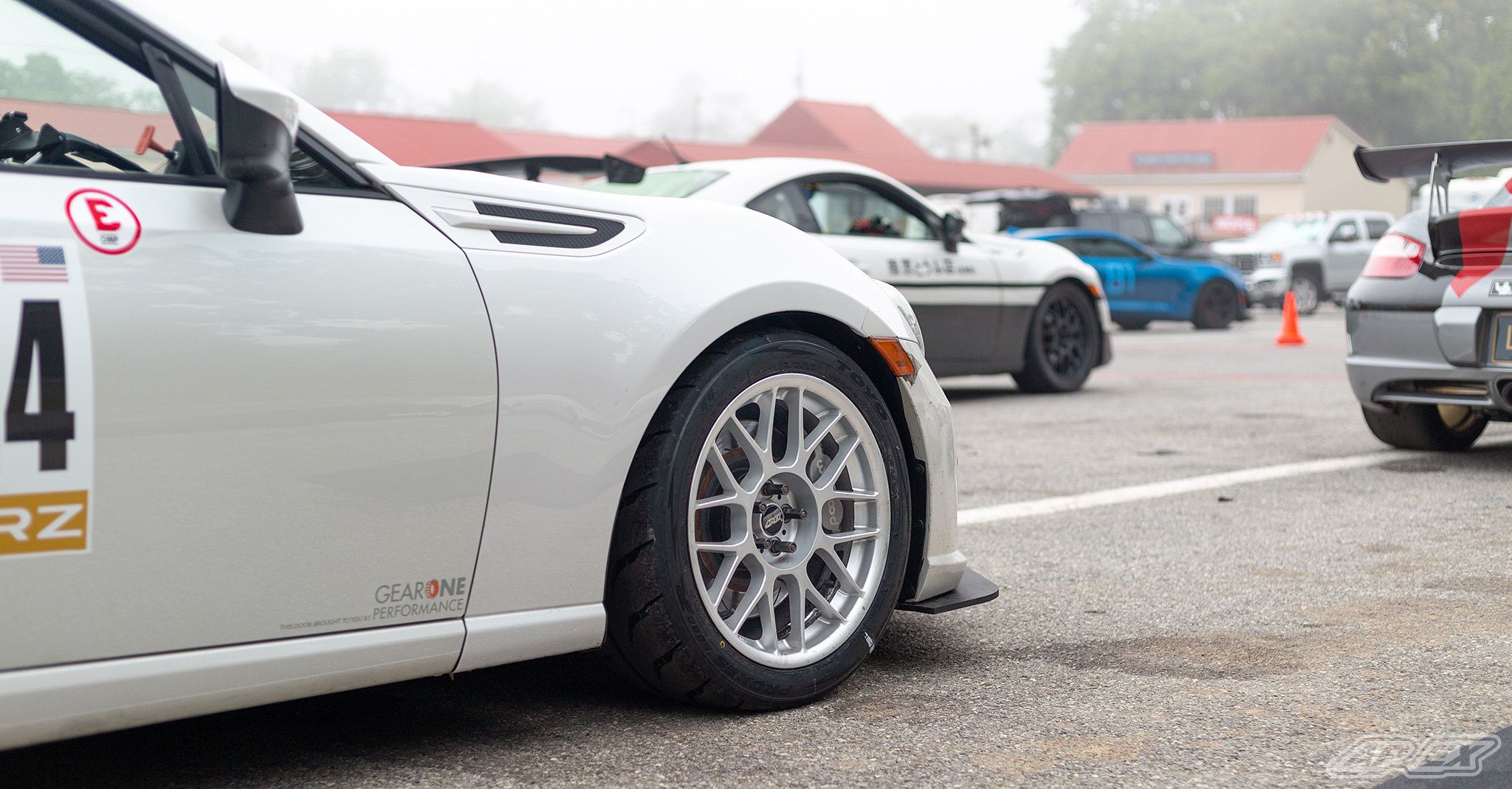 White Subaru ZC6 / Gen 1 BRZ with 17" ARC-8 Apex wheels in Race Silver
