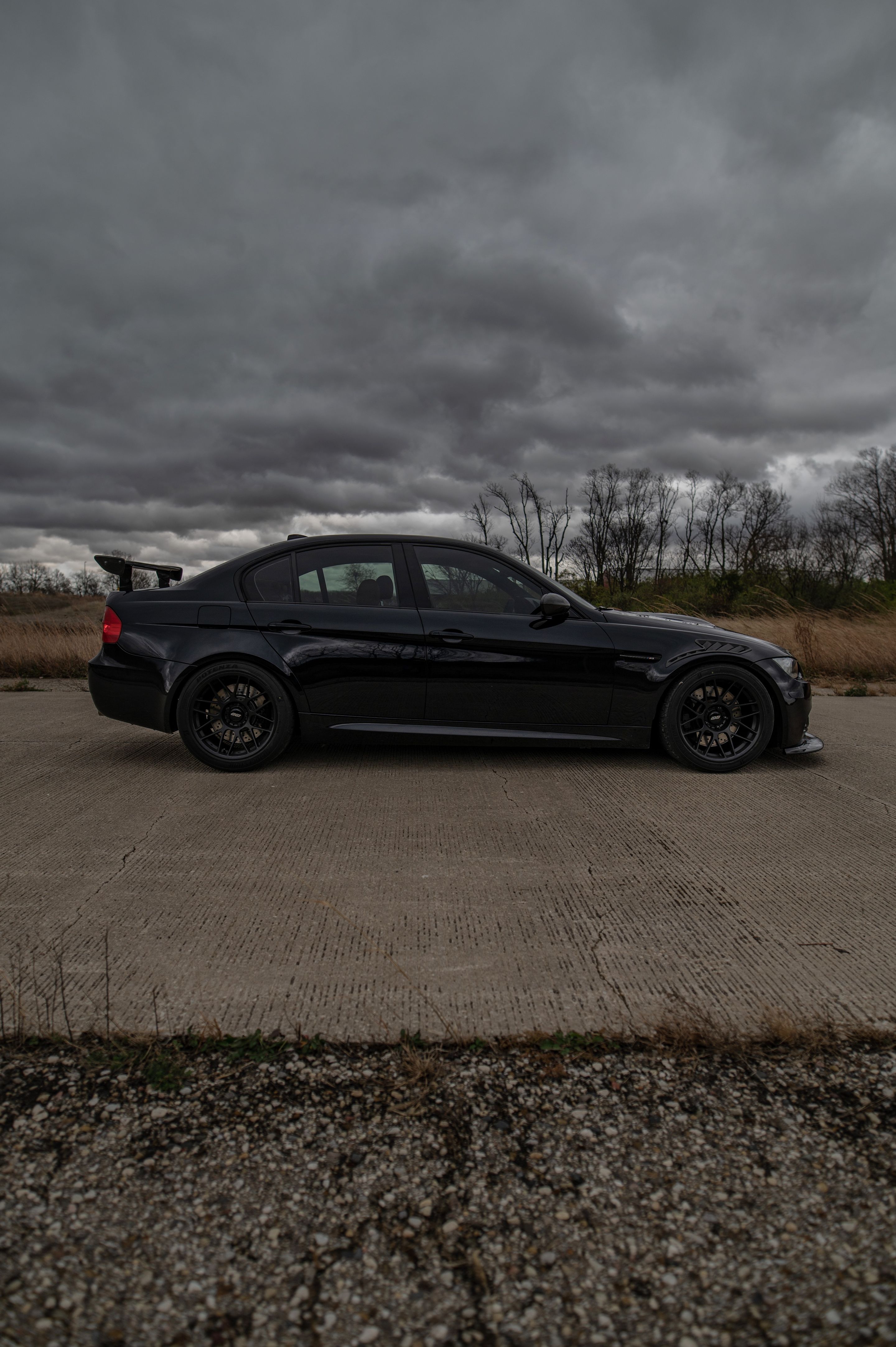 Black BMW E90 Sedan M3 with 18" ARC-8 Apex wheels in Satin Black