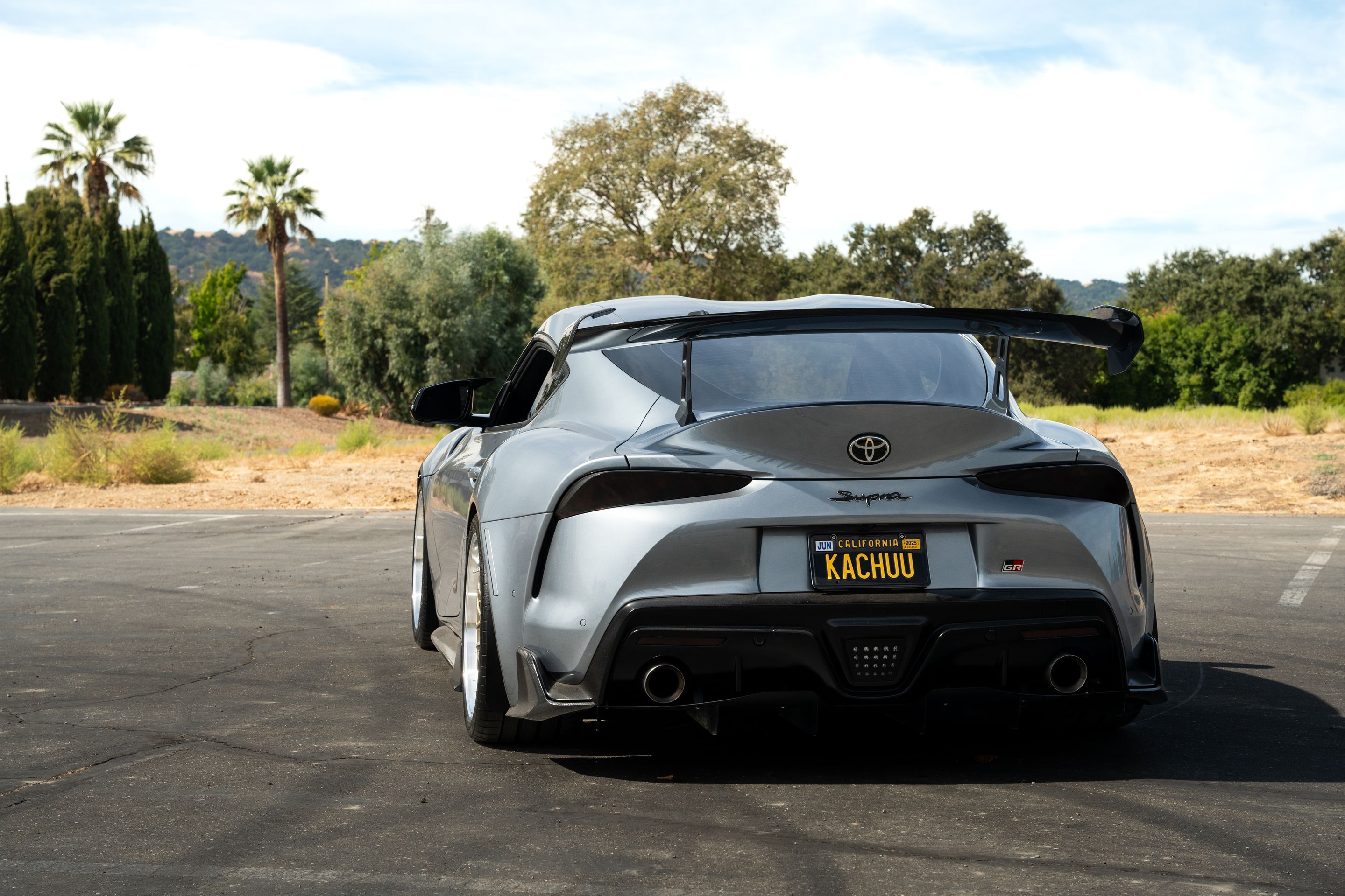 Grey Toyota GR Supra with 19" ML-10RT Apex wheels in Machined Lip Gloss Motorsport Gold