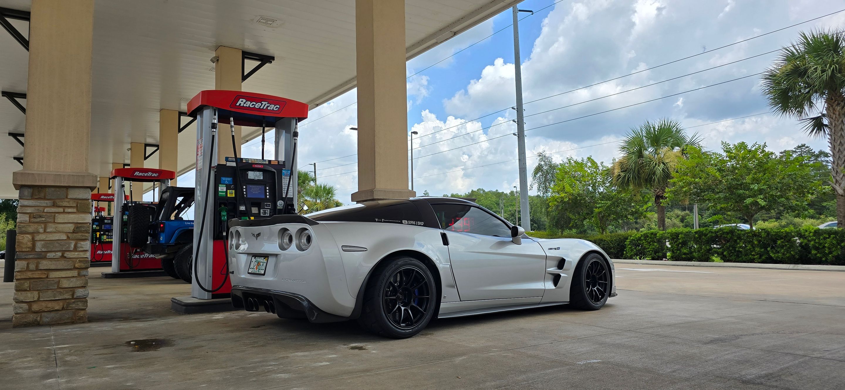 Silver Chevrolet C6 Corvette ZR-1 with 18" SM-10RE Apex wheels in Satin Black