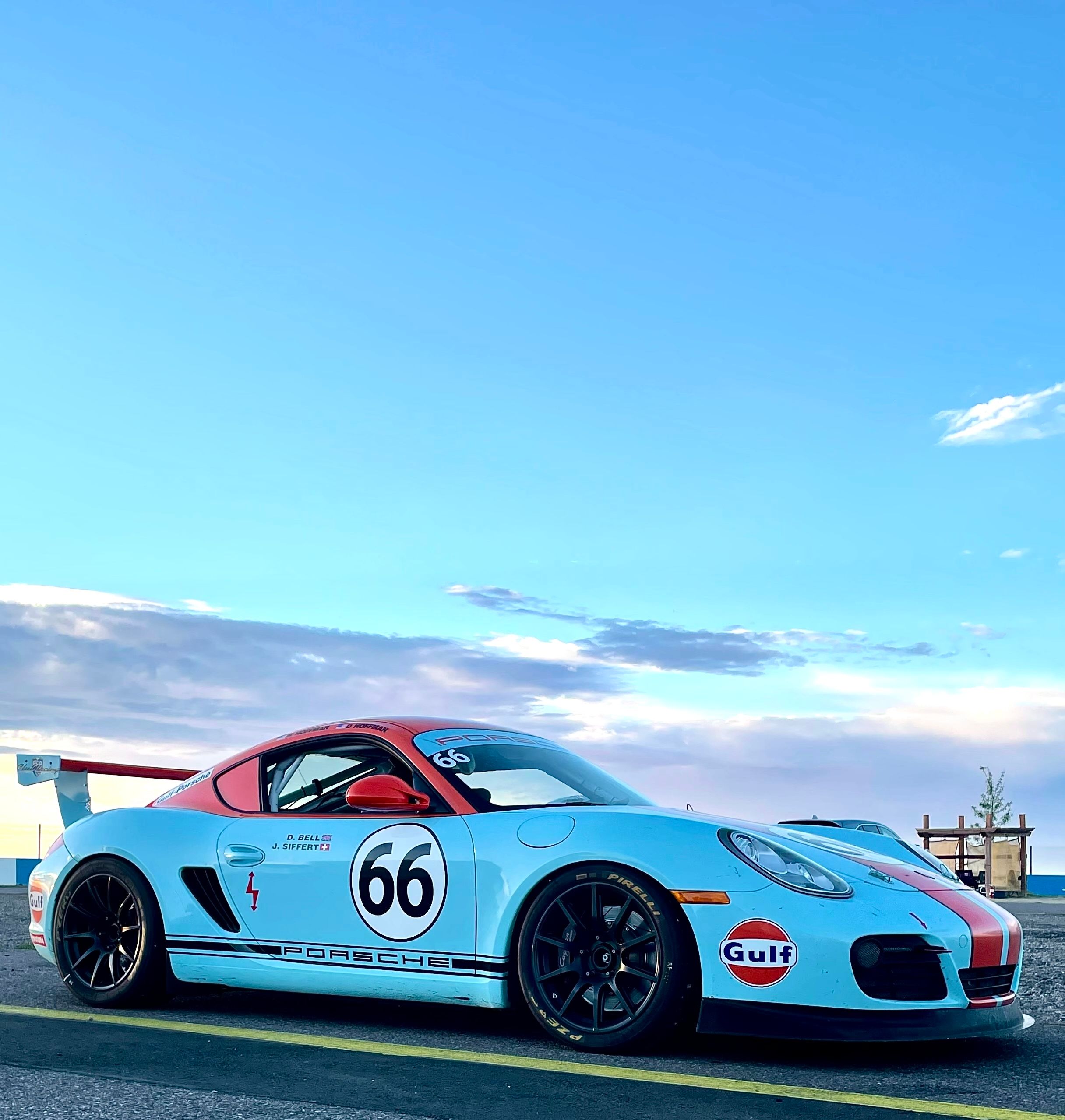 Blue Porsche 987 Cayman S with 18" SM-10 Apex wheels in Satin Black