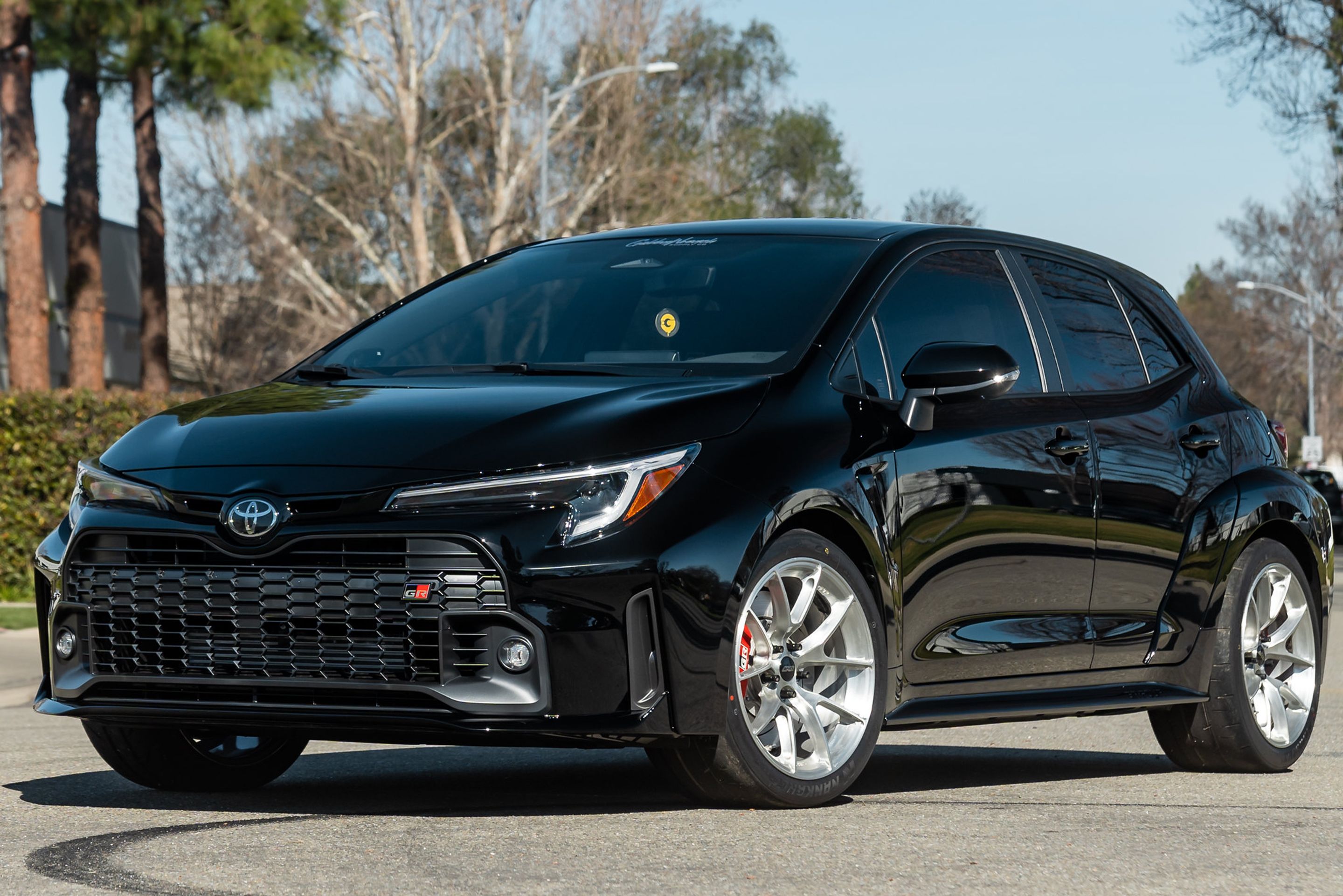 Black Toyota GR Corolla with 18" VS-5RS Apex wheels in Brushed Clear