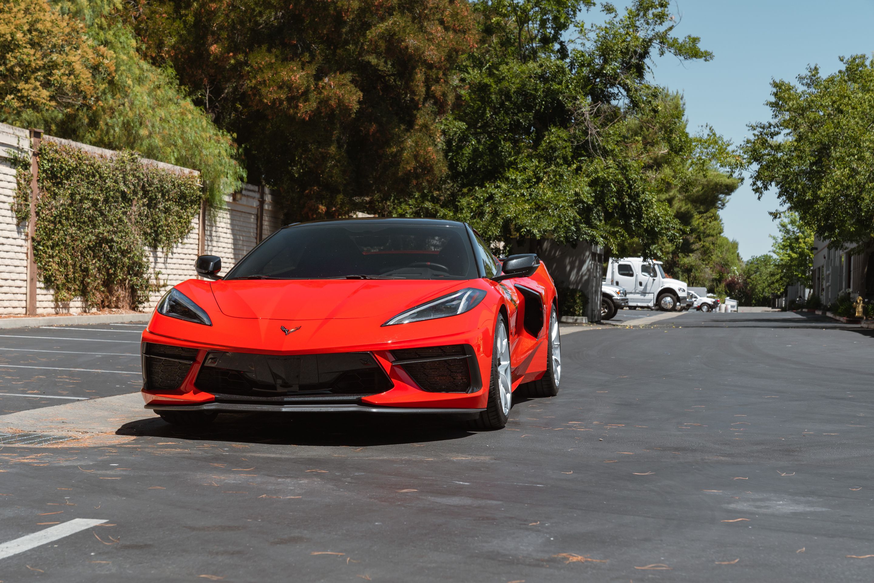 Red Chevrolet C8 Corvette Stingray/Z51 with 19"/20" VS-5RS Apex wheels in Brushed Clear