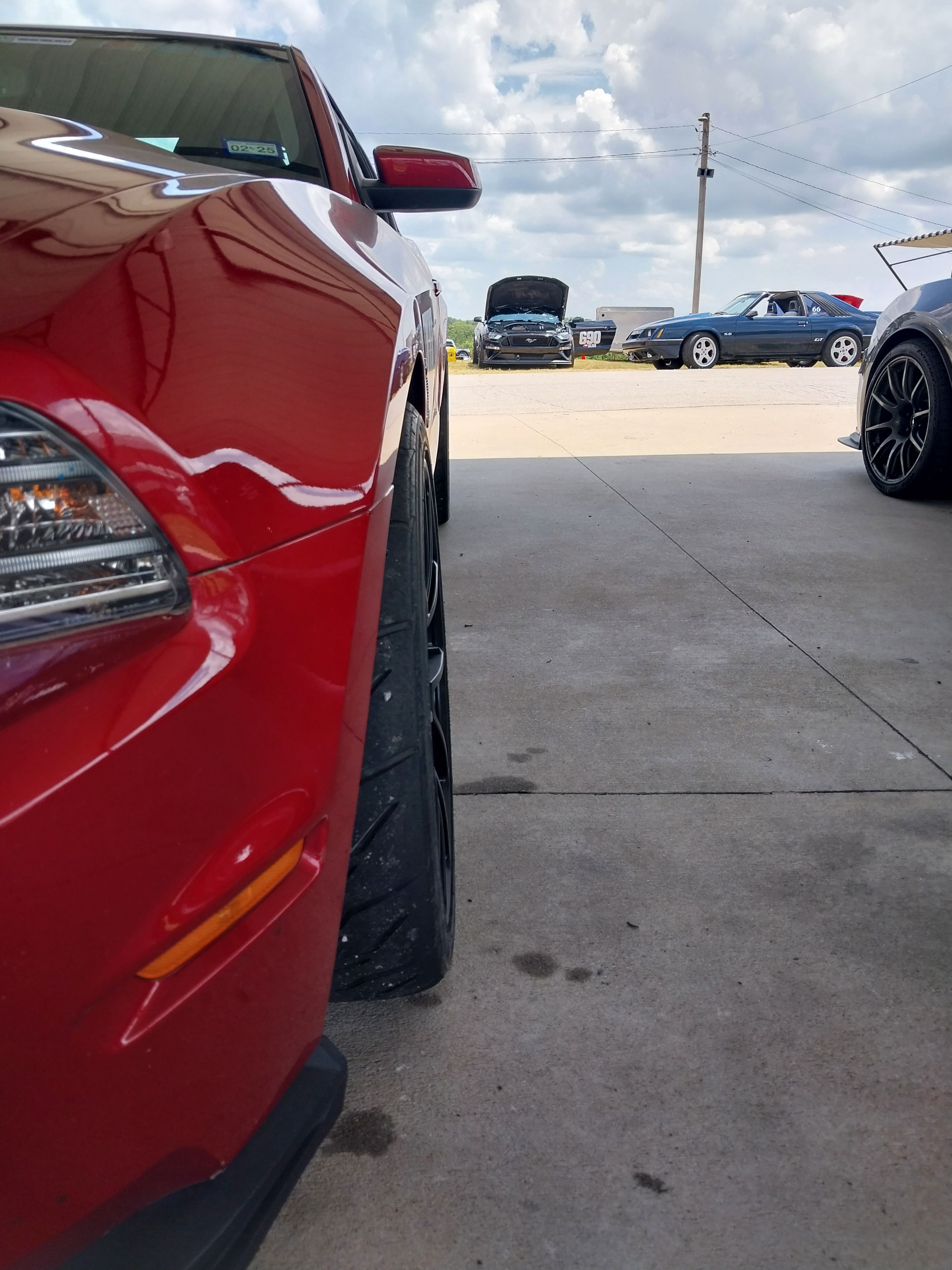 Red Ford S197 Mustang GT500 with 19" VS-5RE Apex wheels in Satin Black