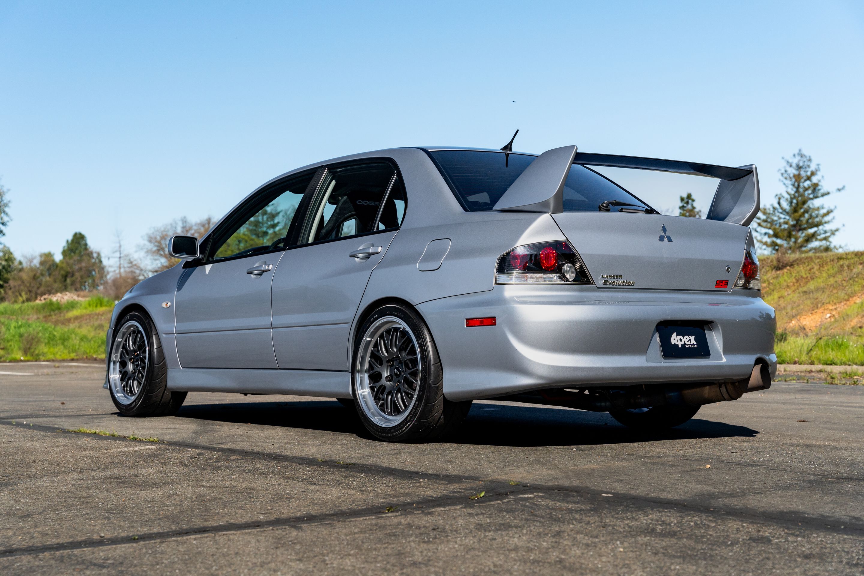 Silver Mitsubishi Lancer Evolution IX with 18" ML-10RT Apex wheels in Machined Lip Anthracite