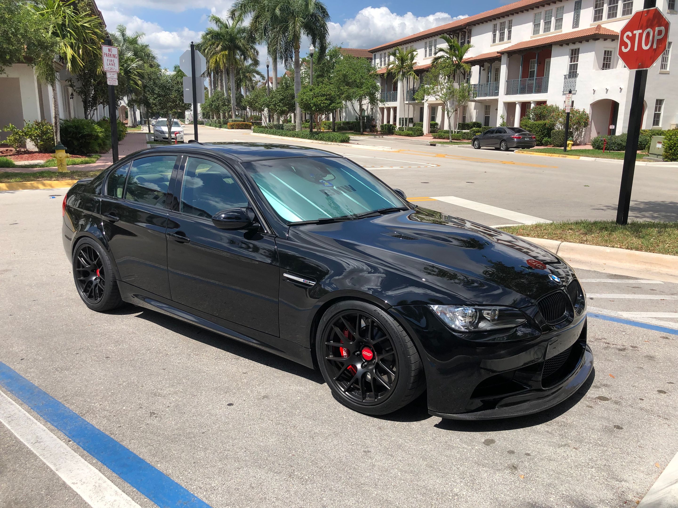 Black BMW E90 Sedan M3 with 18" EC-7R Apex wheels in Satin Black