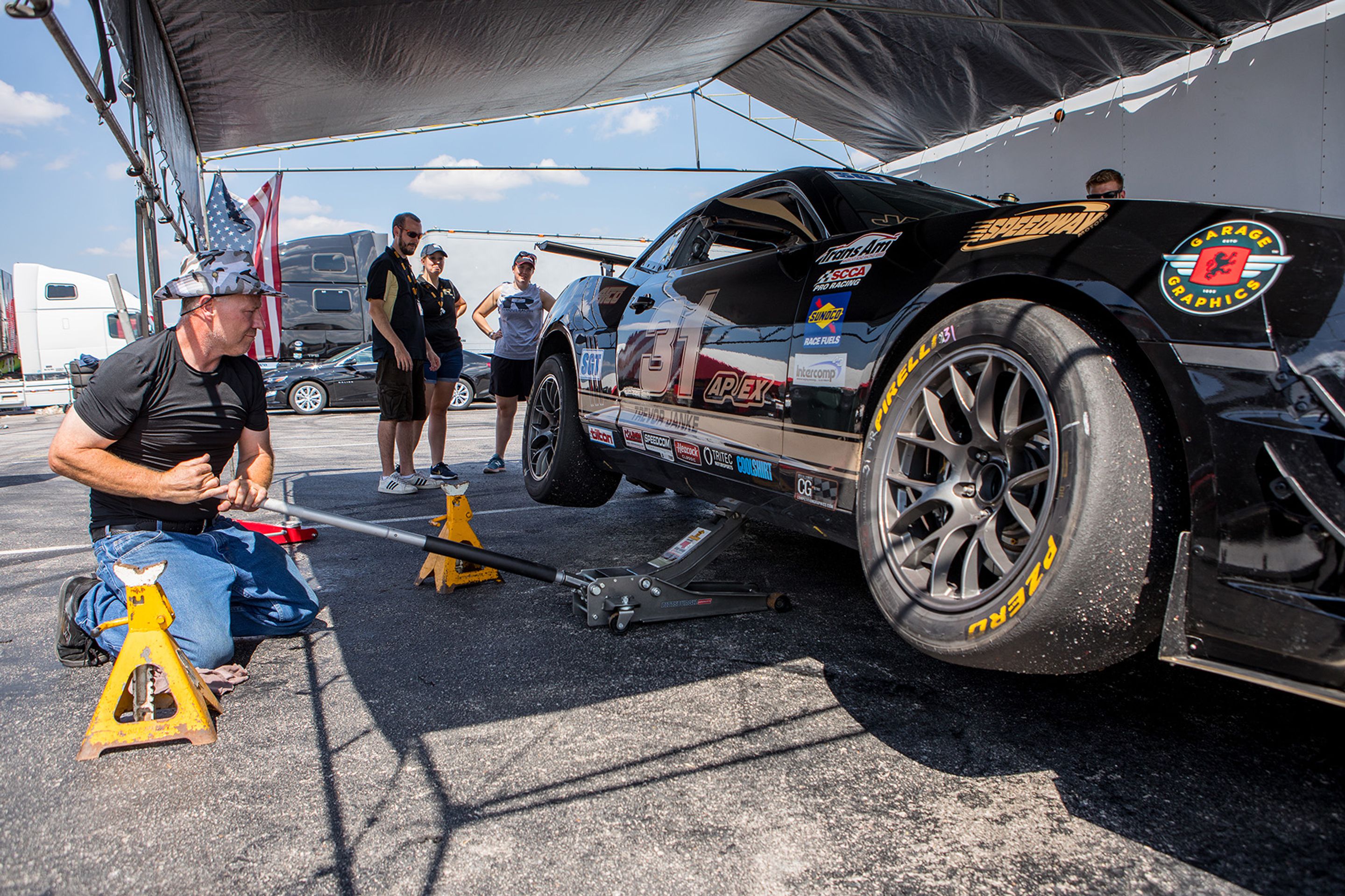 Black Chevrolet 5th Gen Camaro SS with 18" EC-7 Apex wheels in Anthracite
