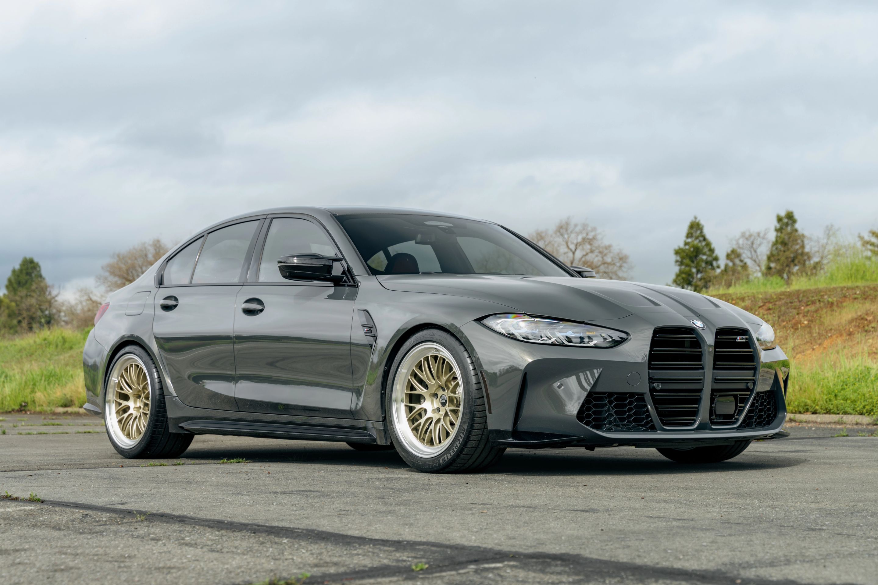 Grey BMW G80 M3 with 19"/20" ML-10RT Apex wheels in Machined Lip Gloss Motorsport Gold