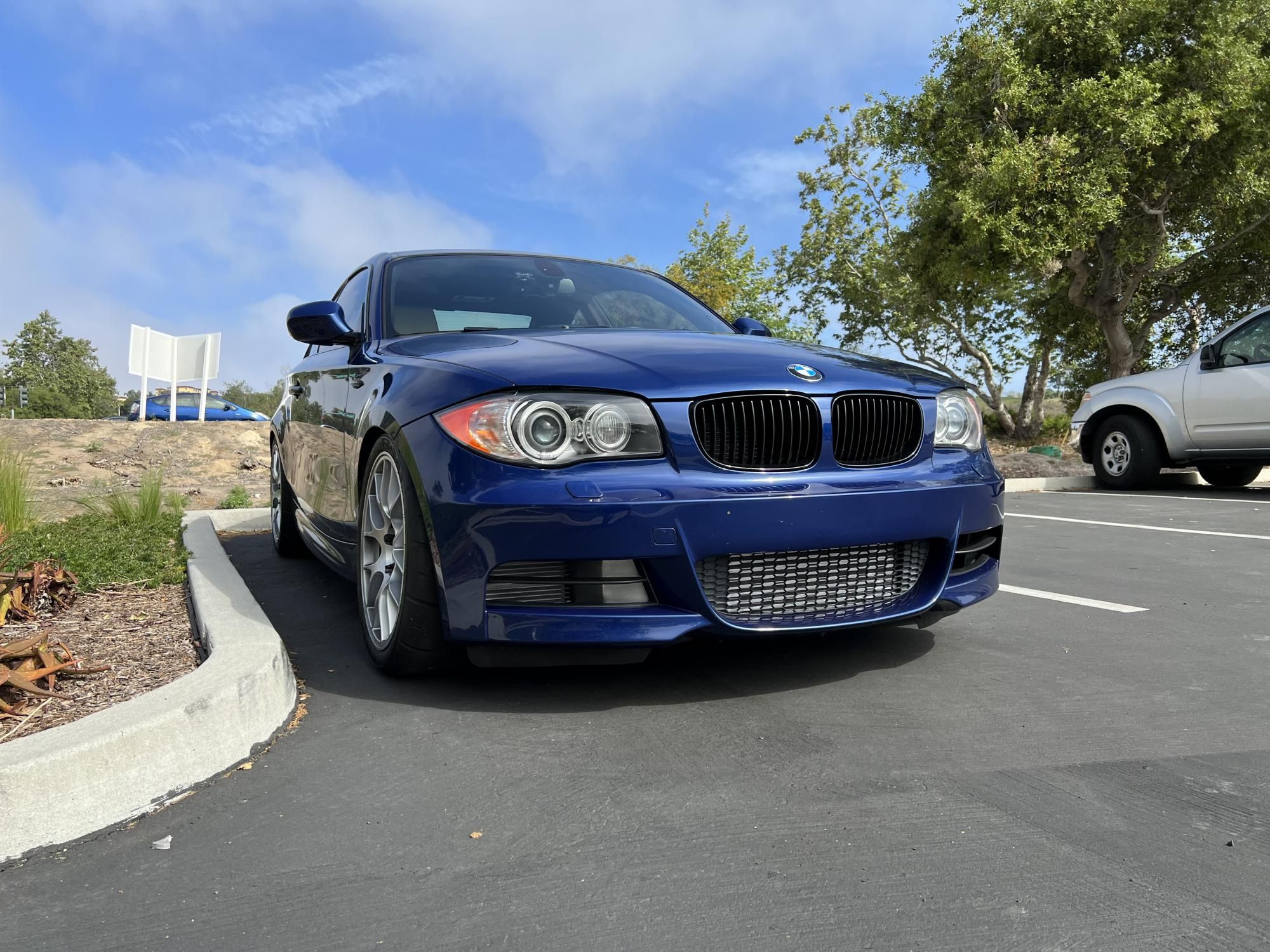 Blue BMW E82 Coupe 1 Series with 18" EC-7 Apex wheels in Race Silver