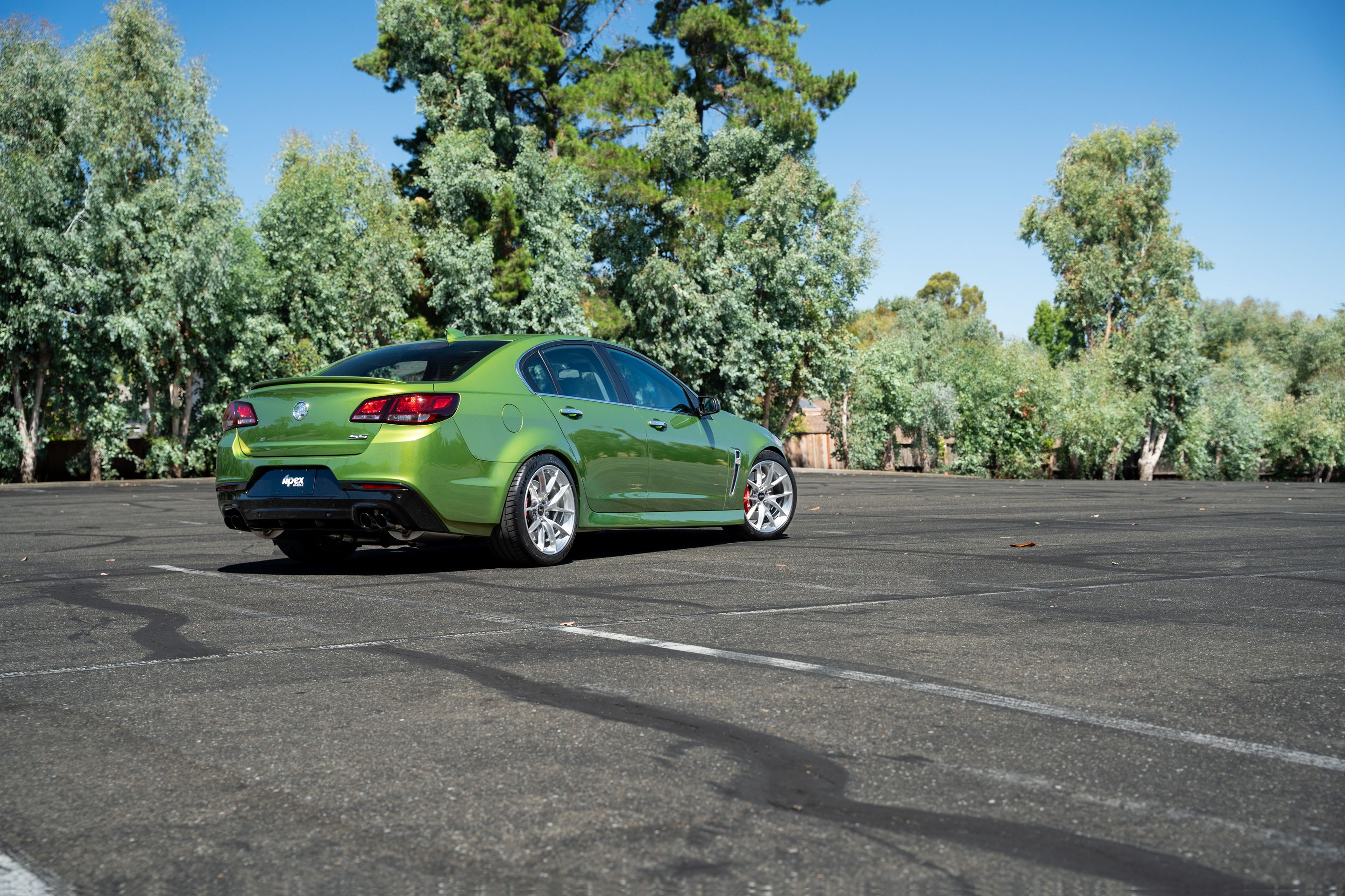 Green Chevrolet SS with 19" VS-5RS Apex wheels in Brushed Clear