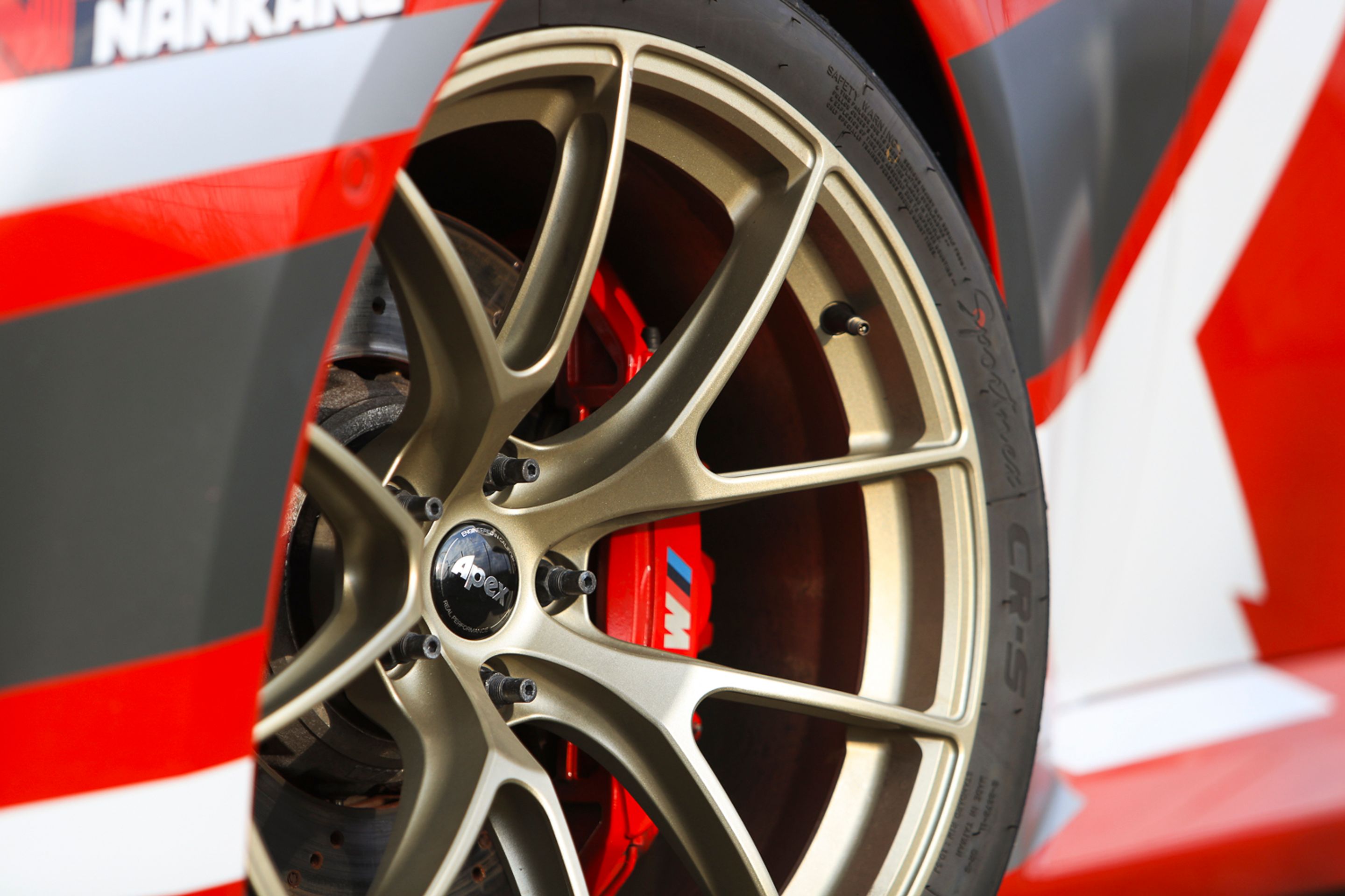 Red BMW G87 M2 with 19" VS-5RS Apex wheels in Motorsport Gold