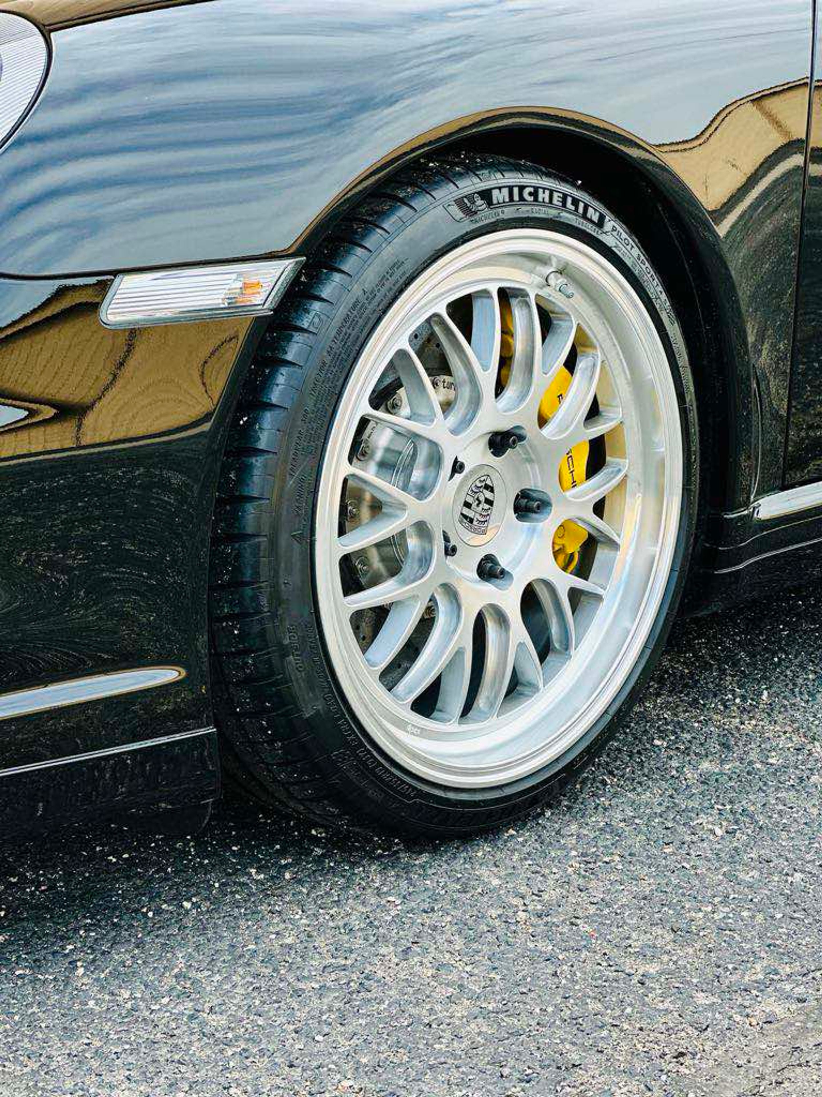 Black Porsche 911 997 Turbo with 19" ML-10RT Apex wheels in Machined Lip Brushed Clear